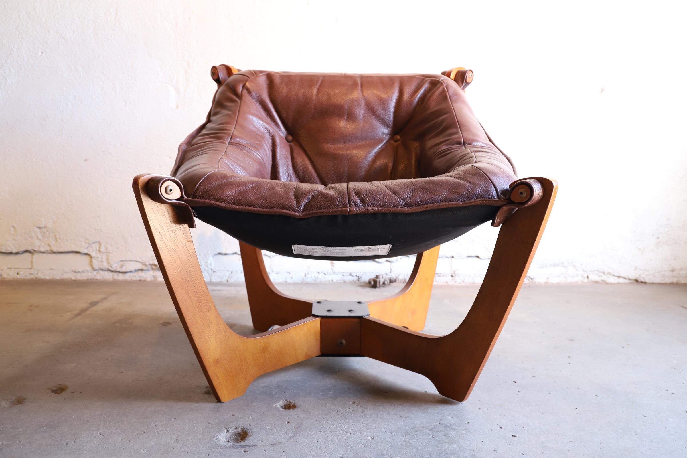 A super comfortable, lounge chair in rich burgundy colored leather. 