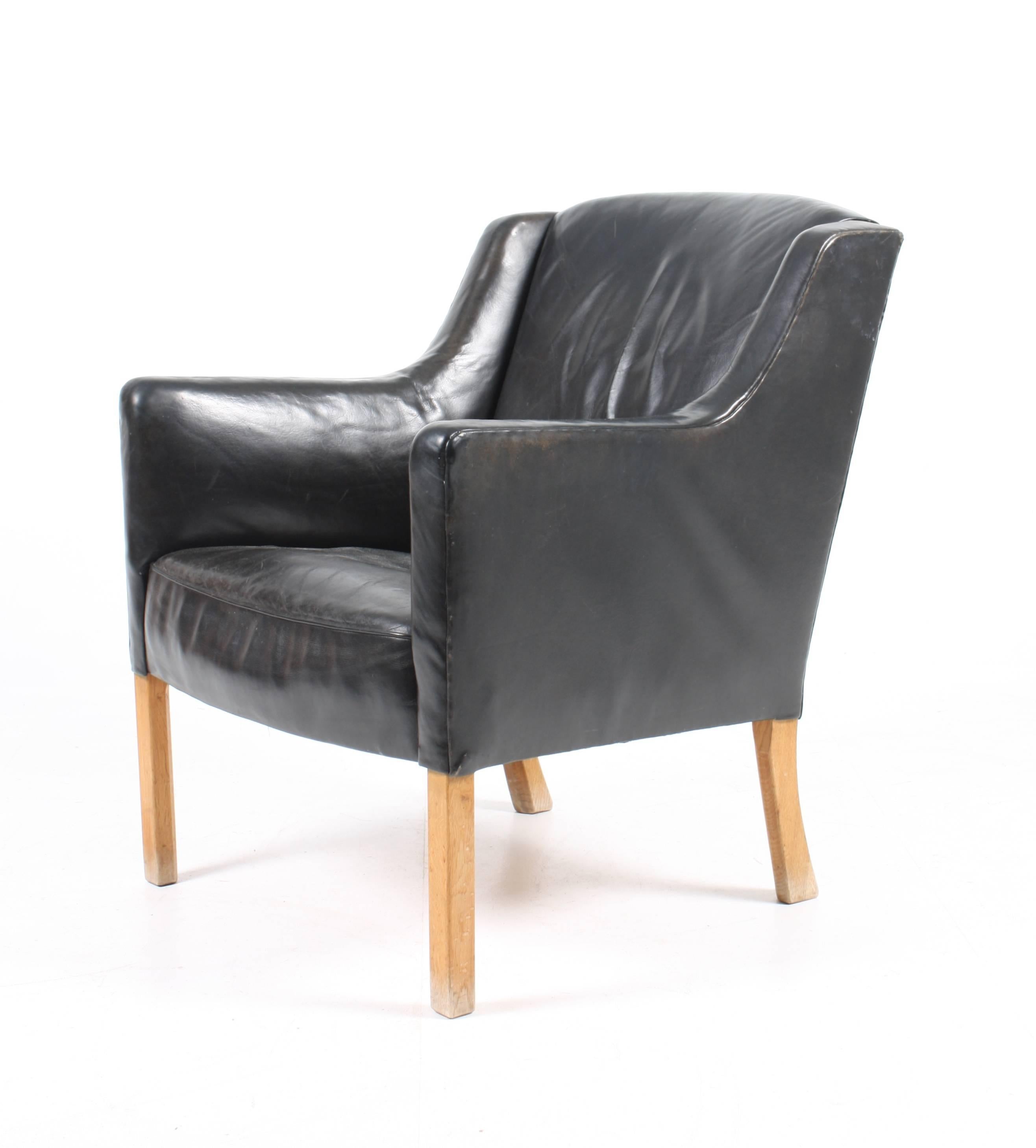 Scandinavian Modern Lounge Chair by Ole Wanscher For Sale