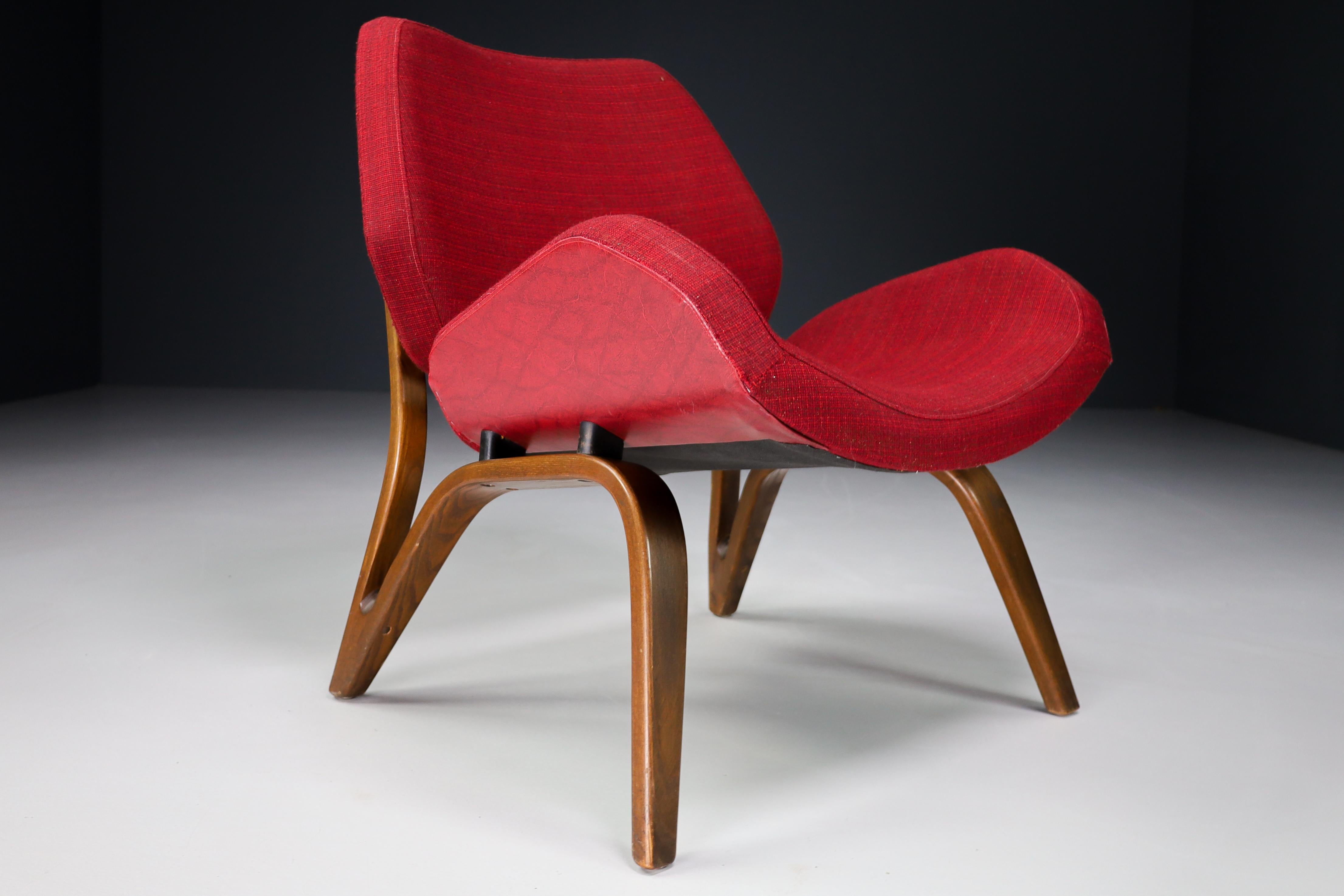 Lounge chair by Paul Bode for Deutsche Federholzgesellschaft, Germany 1954
Rare original lounge chair in original fabric made by Deutsche Federholz-Gesellschaft, Kassel. Laminated ash wood, stained dark, laminated wood, laminated dark red, dark red
