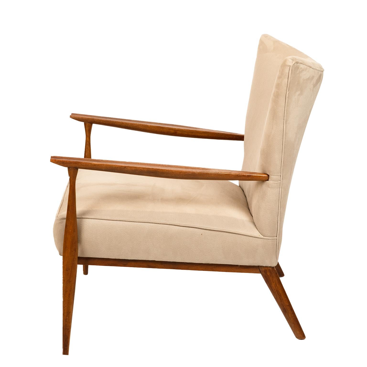 A very cool and comfortable classic mid century lounge chair with generous curved back by American design icon Paul McCobb….Exposed wood arms and legs. Upholstery is in very good as found condition from a smoke free home.
Very Mad Men!