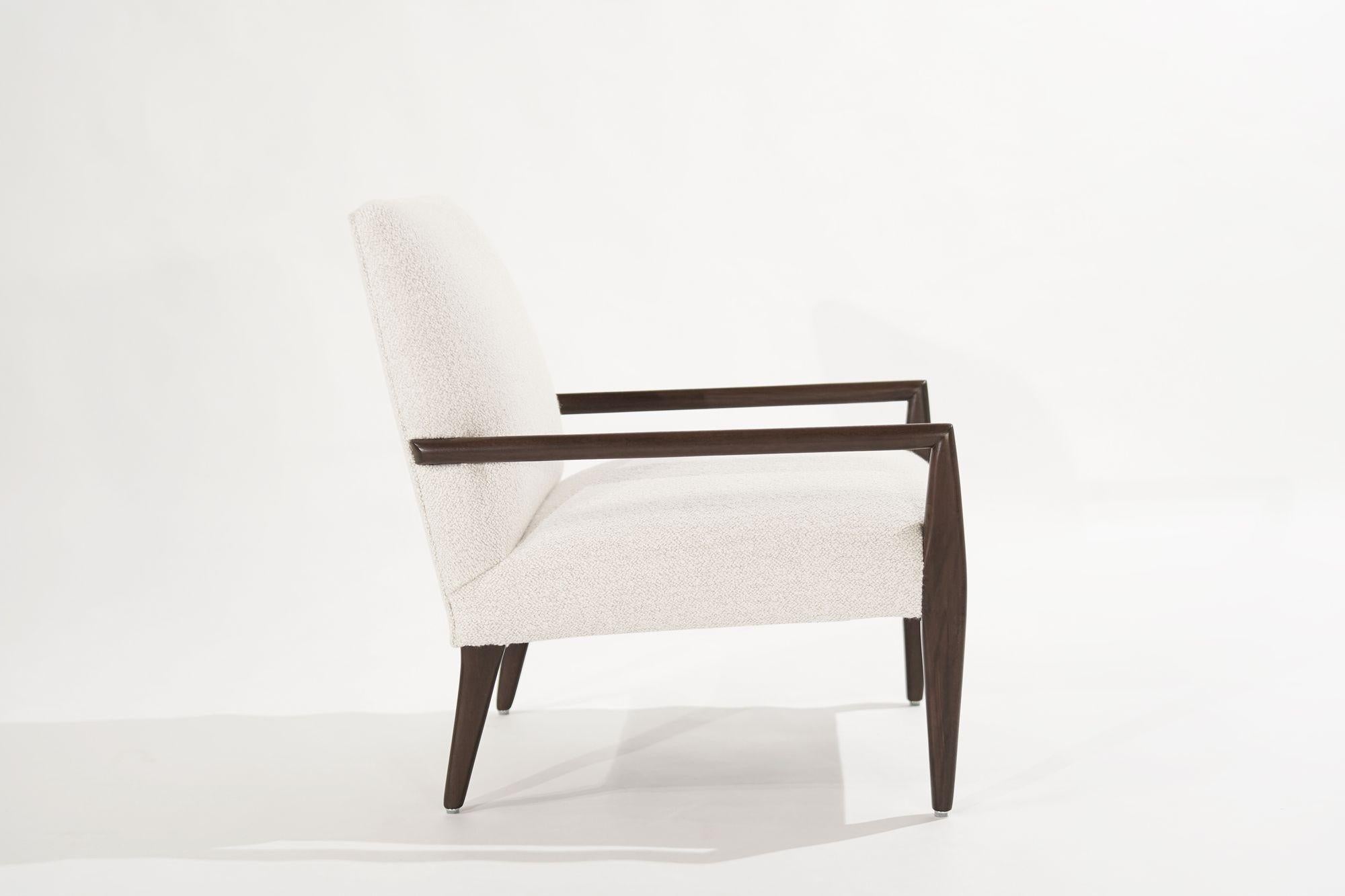 Lounge chair executed in mahogany designed by T.H. Robsjohn-Gibbings for Widdicomb, circa 1950-1959. Framework fully restored, reupholstered in off-white bouclé by Holly Hunt.
 
Other designers from this period include Paul McCobb, Vladimir Kagan,
