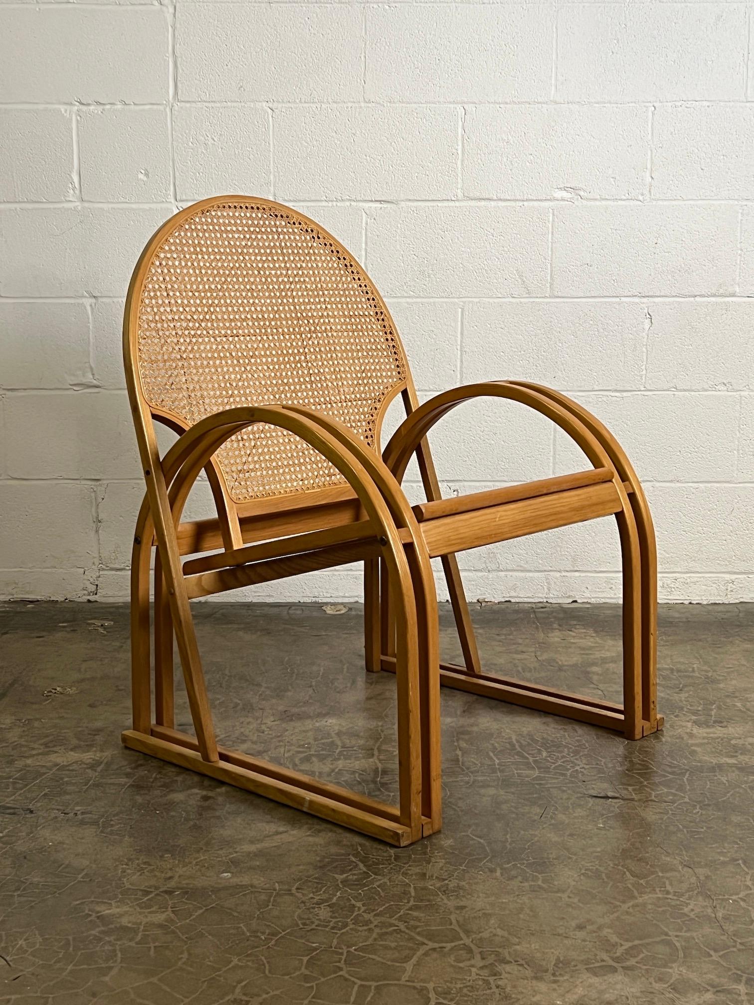 A sculptural cane lounge chair designed by Vermont Tubbs.