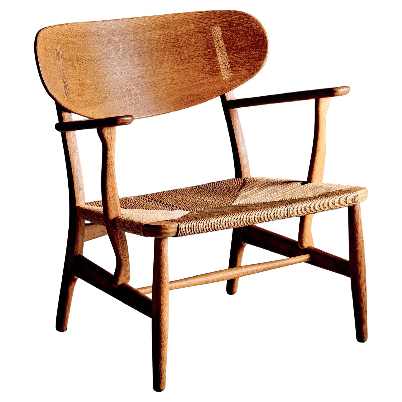 Chaise longue CH-22 par Hans Wegner pour Carl Hansen & Son