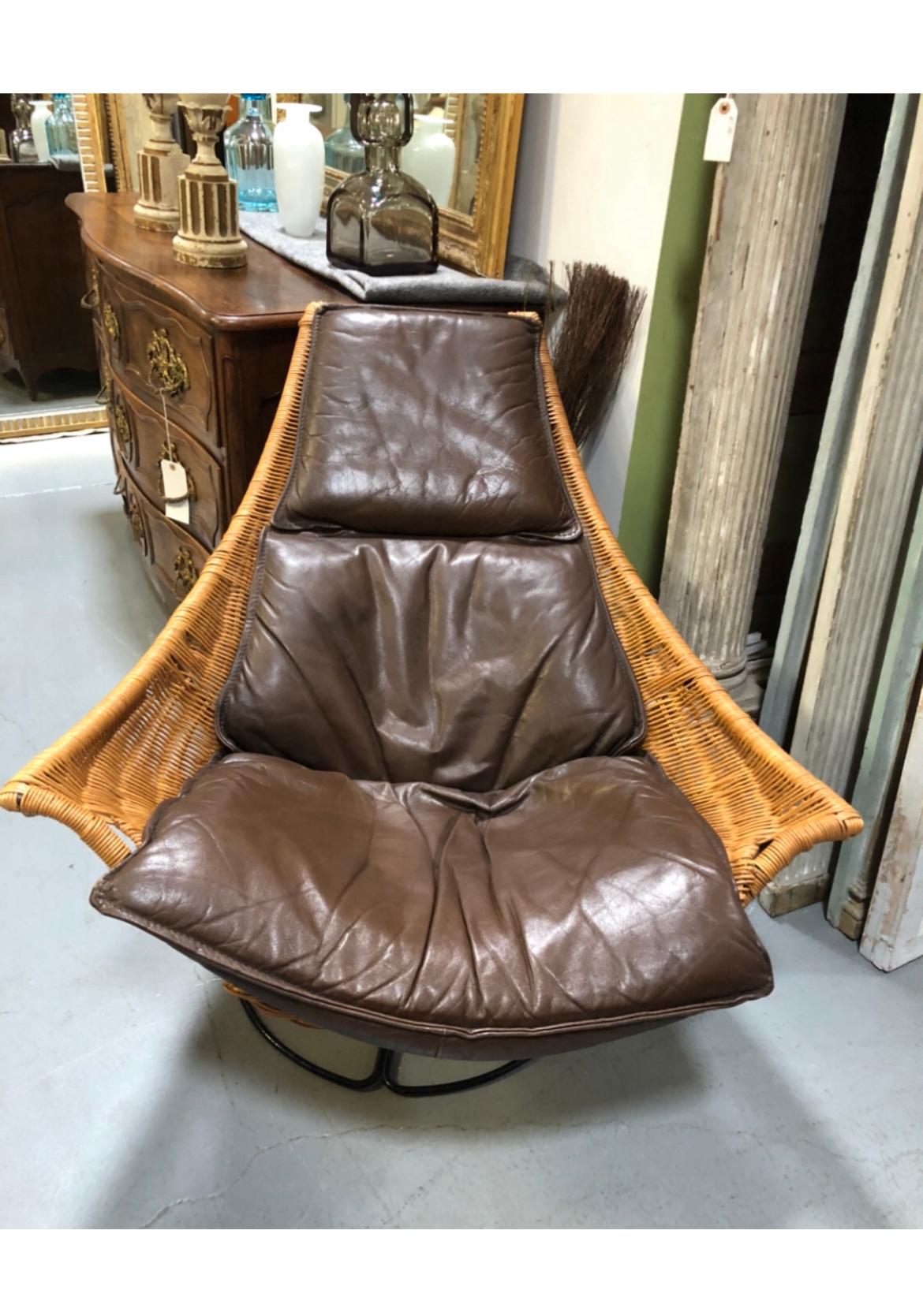 Excellent condition in cane and leather cushion. Super comfortable.