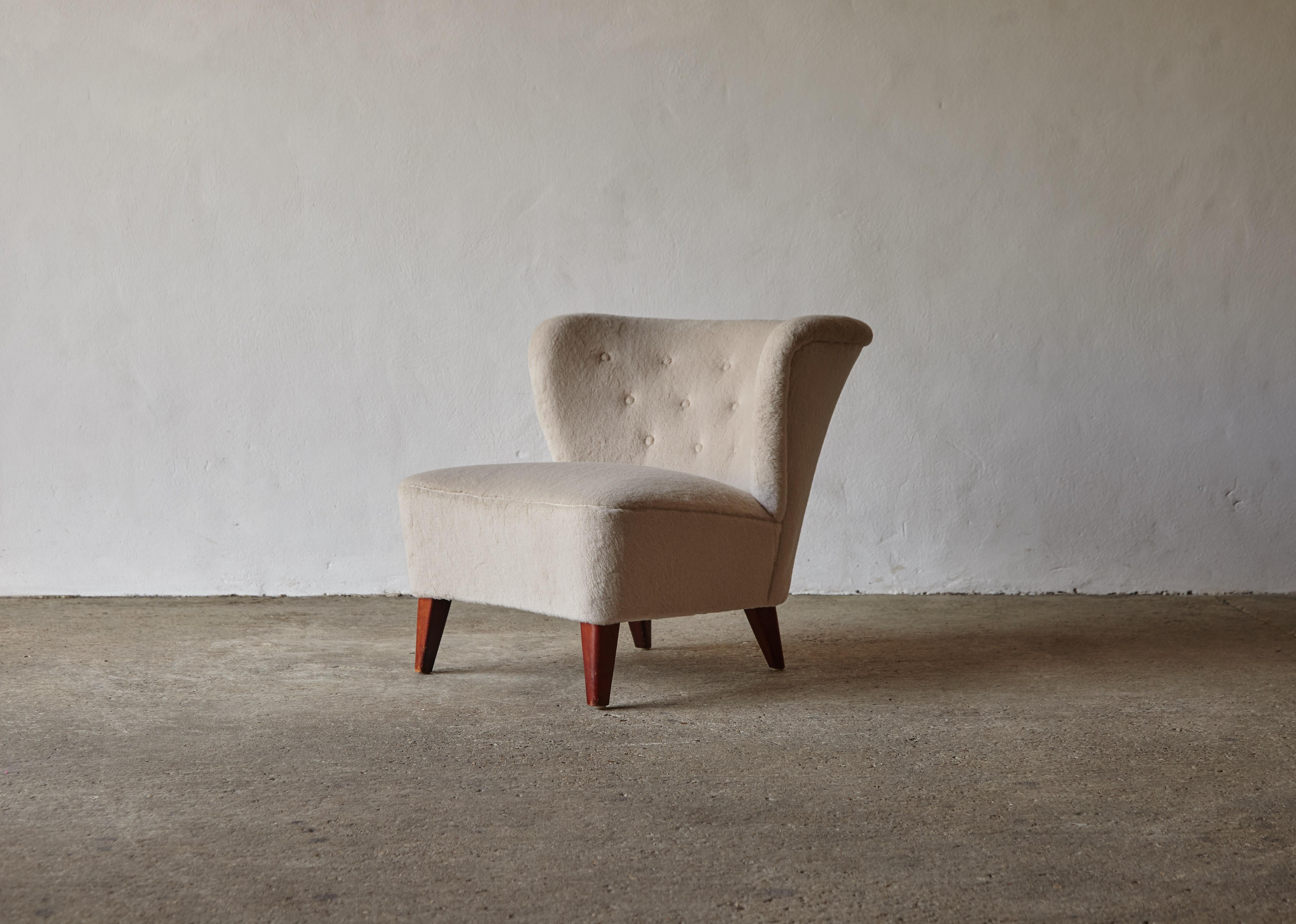 Gösta Jonsson lounge chair, 1950s, Sweden, newly upholstered in ivory pure Alpaca wool. Fast shipping worldwide.



