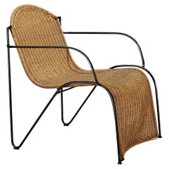 Lounge Chair in Cane and Lacquered Black Metal