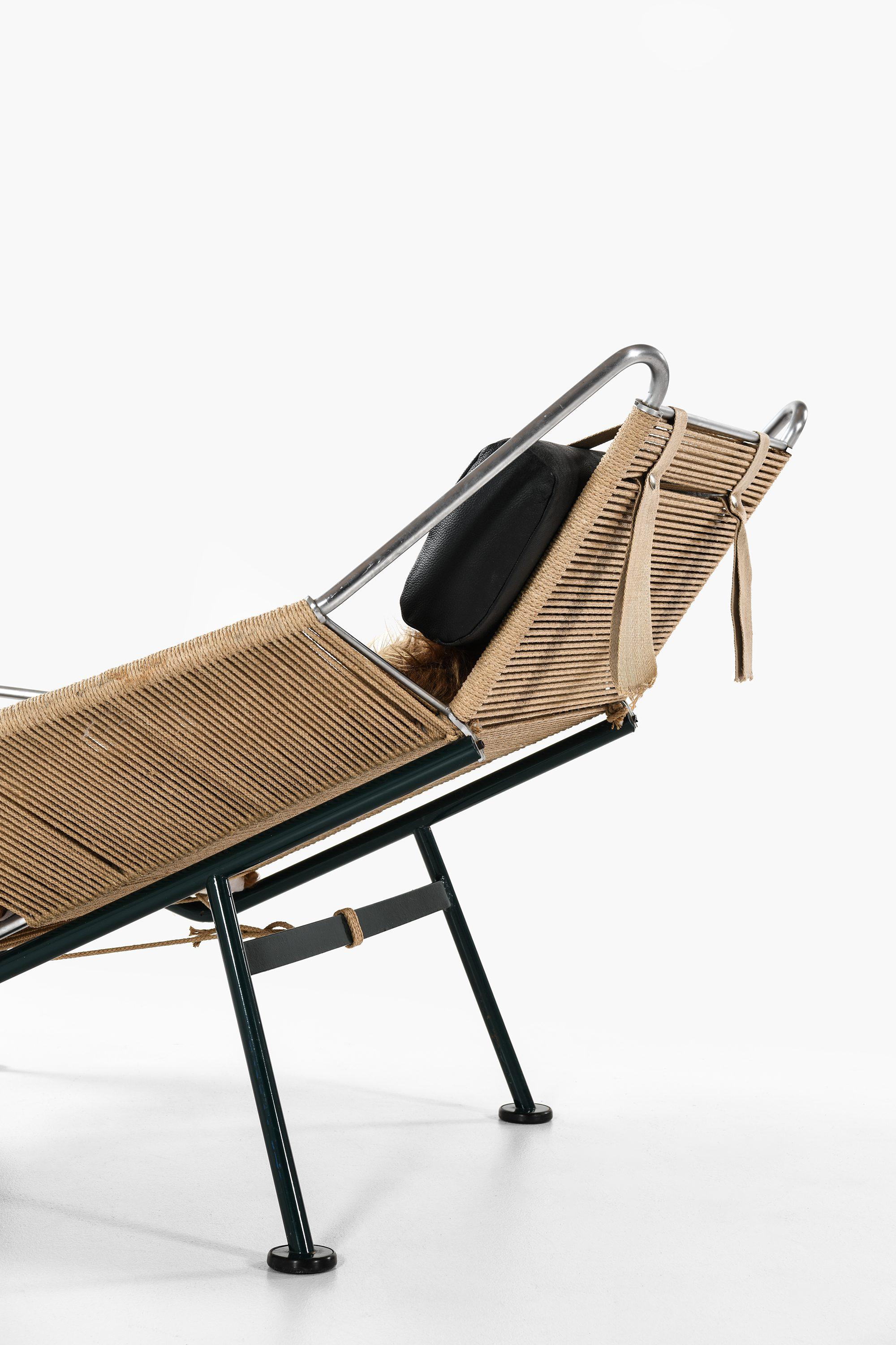 Danish Lounge Chair in Metal and Sheepskin by Hans Wegner, 1960s For Sale