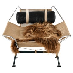 Vintage Lounge Chair in Metal and Sheepskin by Hans Wegner, 1960s