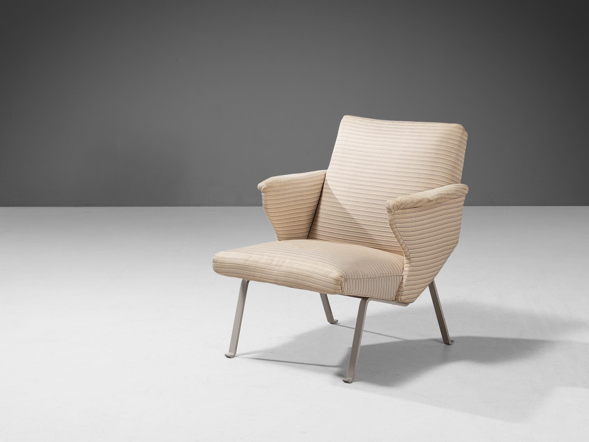 Lounge chair, fabric, lacquered steel, Europe, 1980s.

This elegant-shaped lounge chair has a solid construction featuring geometrical shapes and sharp edges, giving the lounge chair character. The white lacquered steel legs elevate the seat up in a