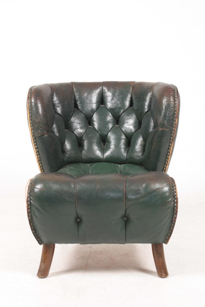 Scandinavian Modern Lounge Chair in Patinated Leather, Made in Denmark, 1940s