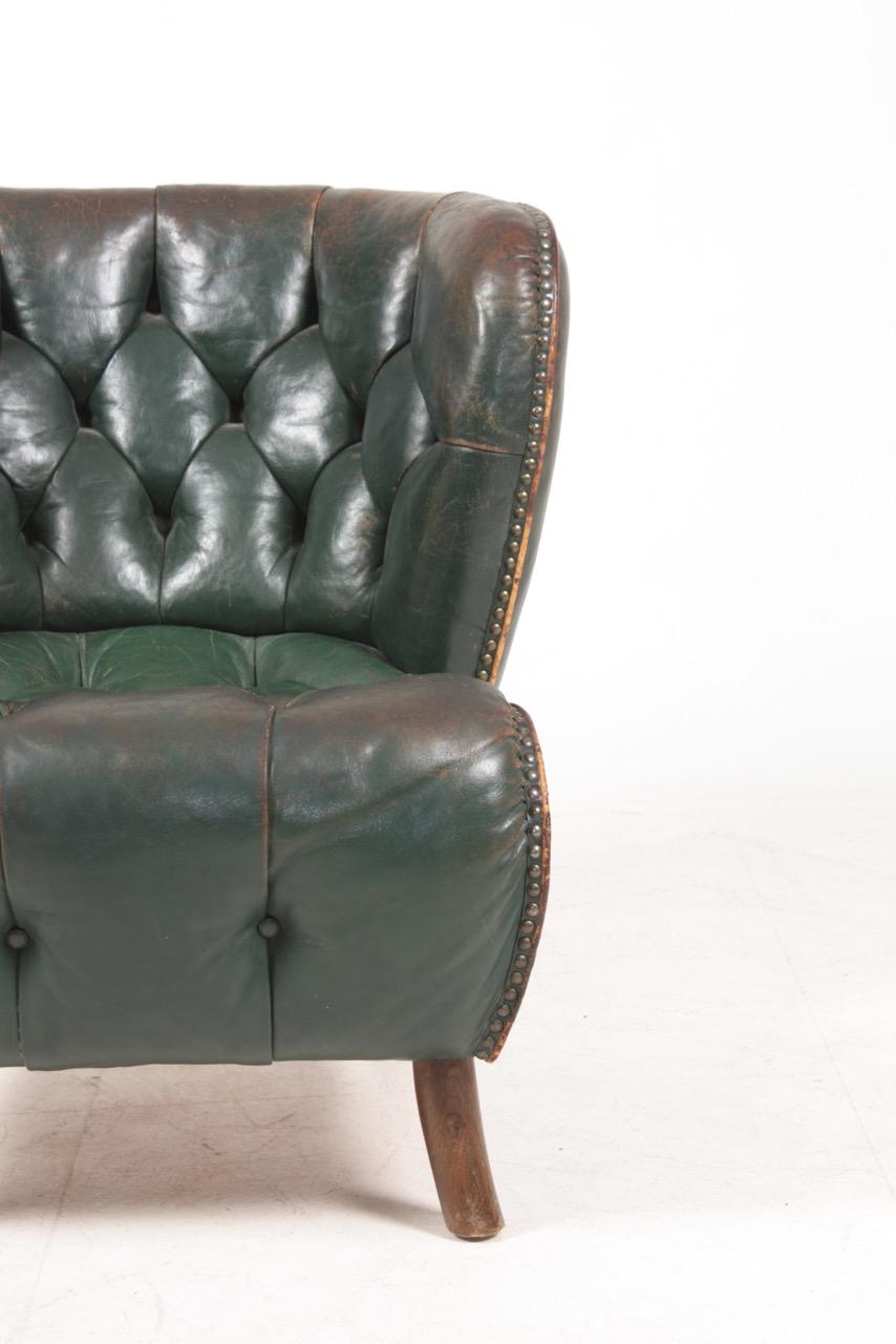 Swedish Lounge Chair in Patinated Leather, Made in Denmark, 1940s