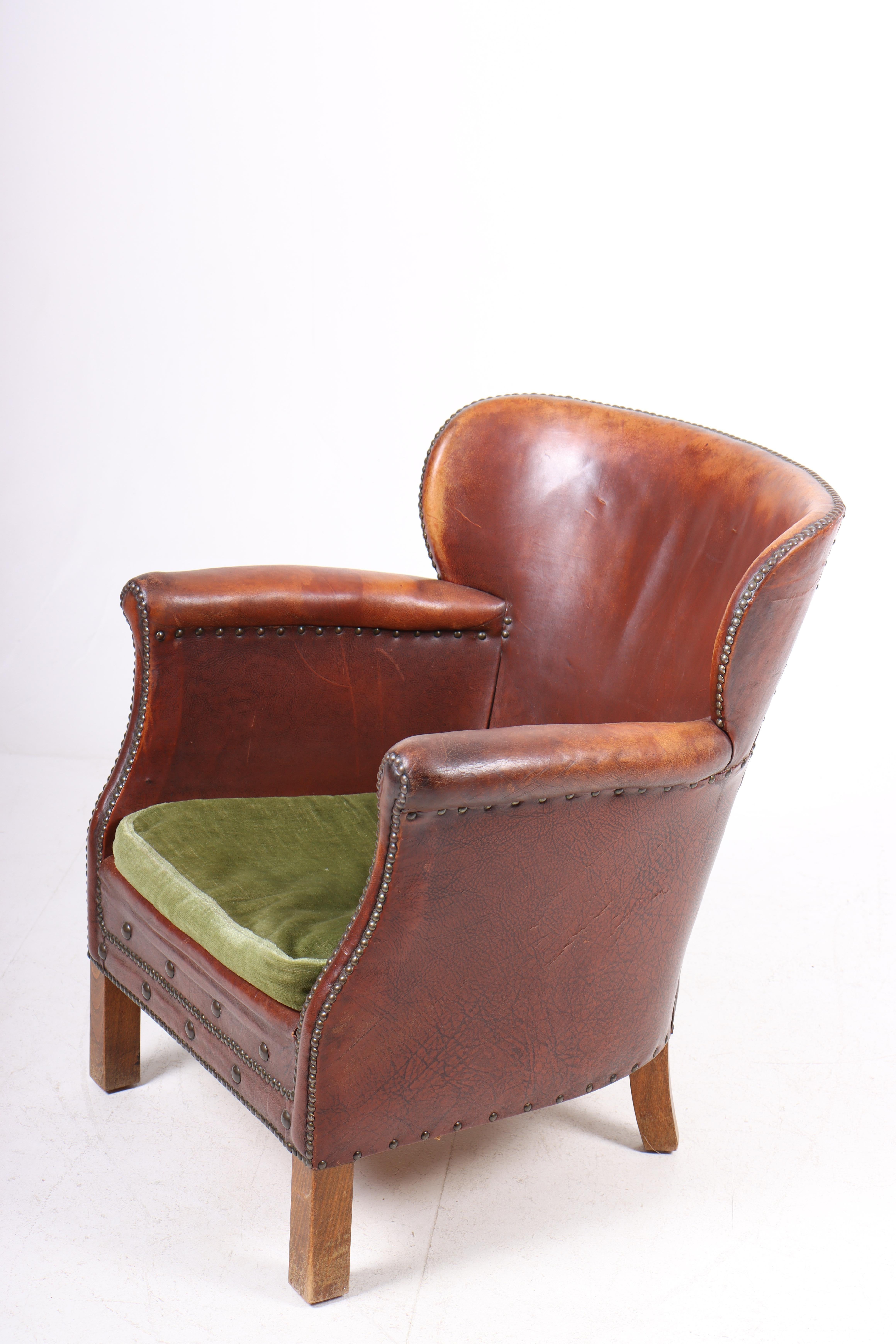 Swedish Lounge Chair in Patinated Leather, Made in Sweden 1940s