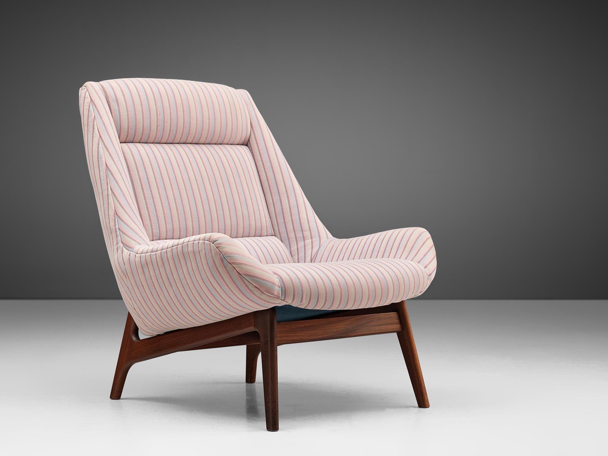 Danish furniture design, easy chair with teak frame, upholstered with patterned fabric, 1960s.

