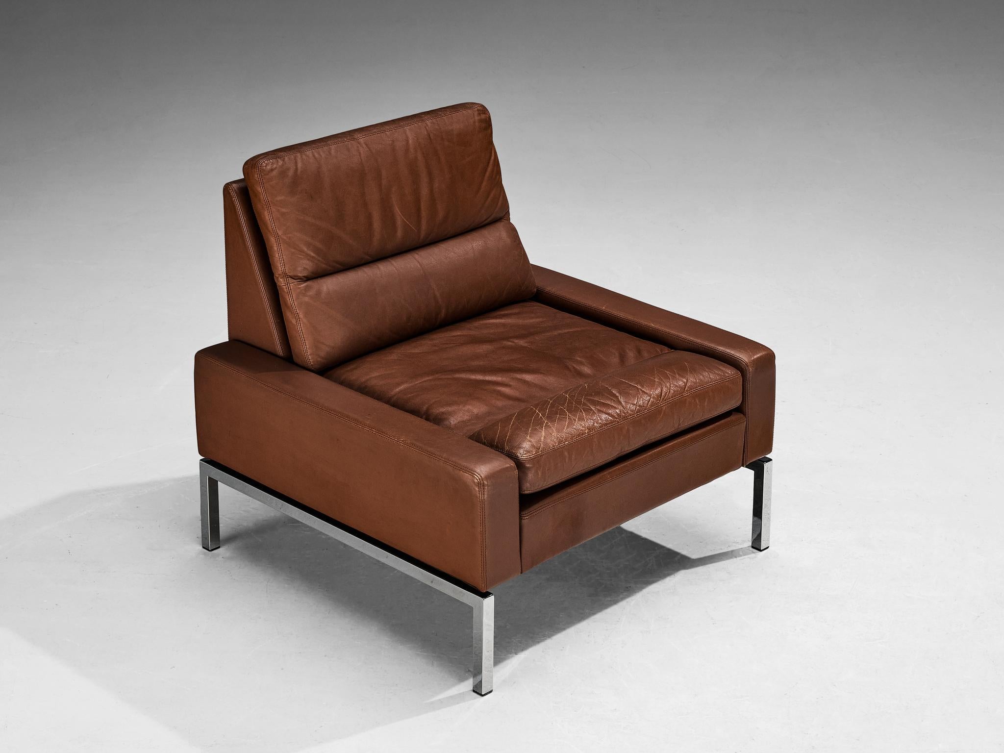 Lounge chair, steel, leather, Europe, 1980s

This comfortable lounge chair shows an elegant steel frame. The combination of steel and leather gives these lounge chairs a modern and rich appearance. Upholstered in brown leather that shows patina,