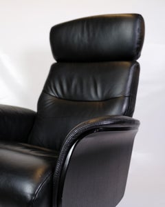 Lounge Chair Made In Black Leather & Aluminum Swivel From 1970s