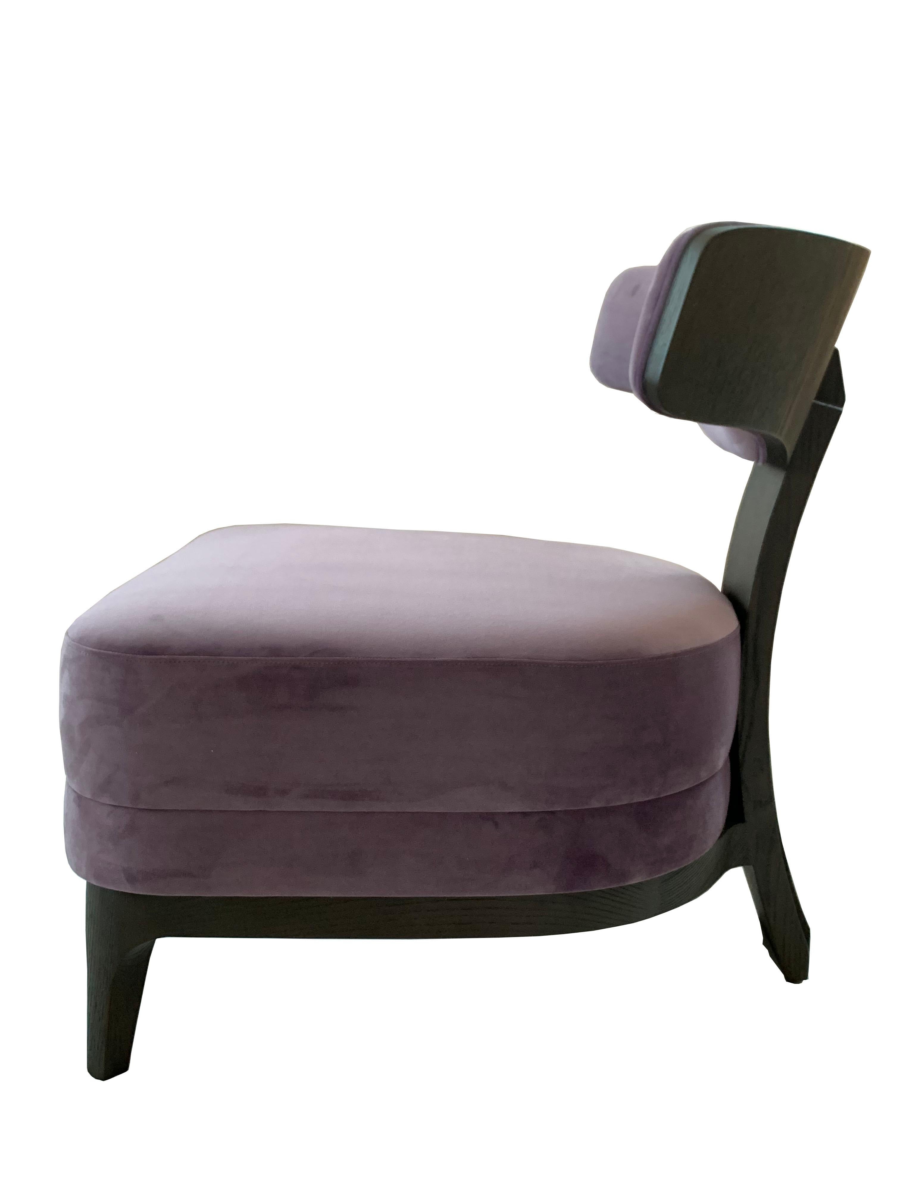 Upholstered lounge chair.
Velvet plum color fabric.
Solid oak and handmade.

Description: Lounge Chair
Color: Brown and Plum
Size: 68 x 71 x 73H cm
Material: Oak and Velvet
Collection: Mid Century Rhythm