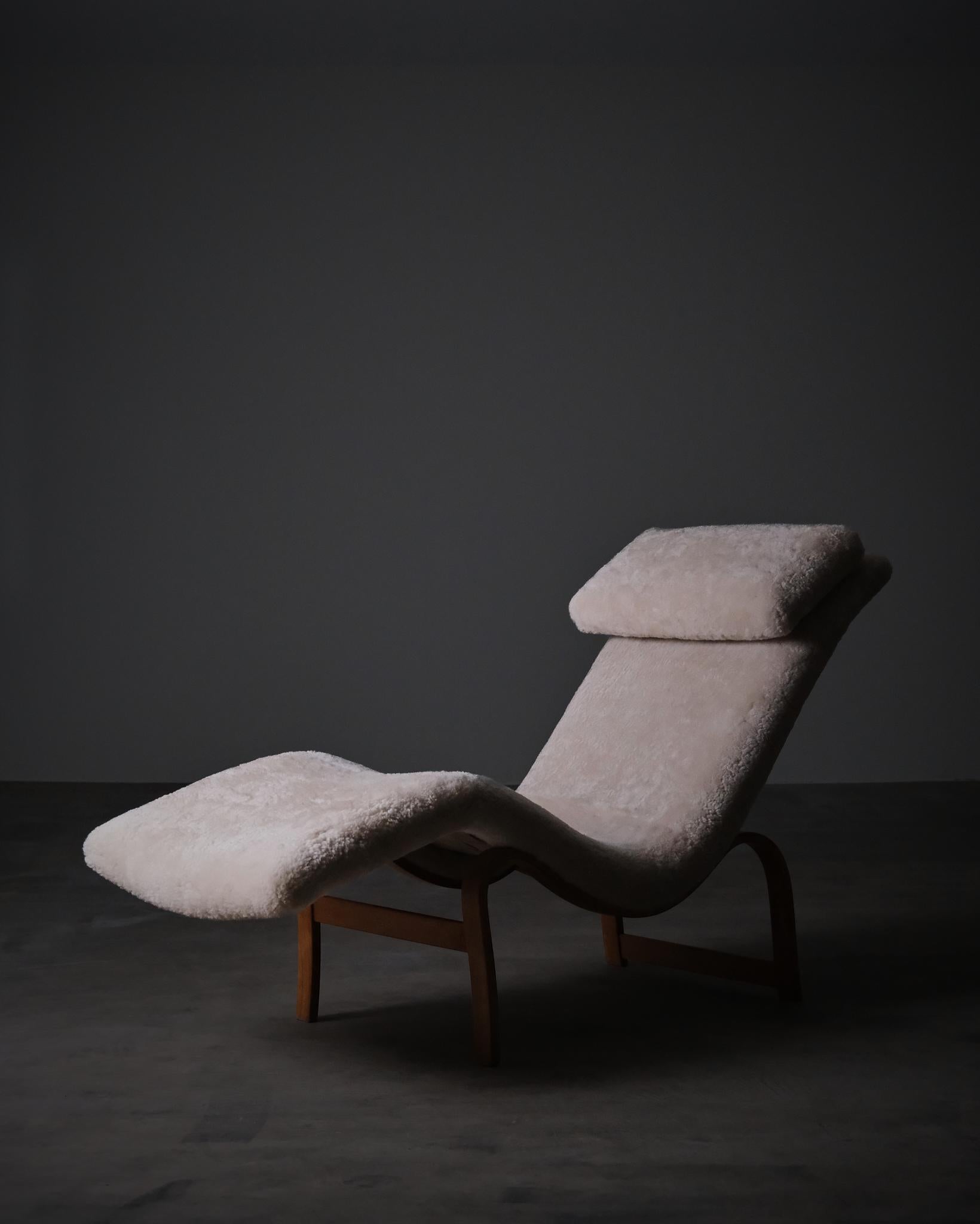 A rare early example of Bruno Mathsson’s Model 36, crafted in beech with a beautifully woven jute seat and fully upholstered in soft sheepskin, including the cushion.

Produced by Firma Karl Mathsson in Värnamo, Sweden, this version dates from 1938