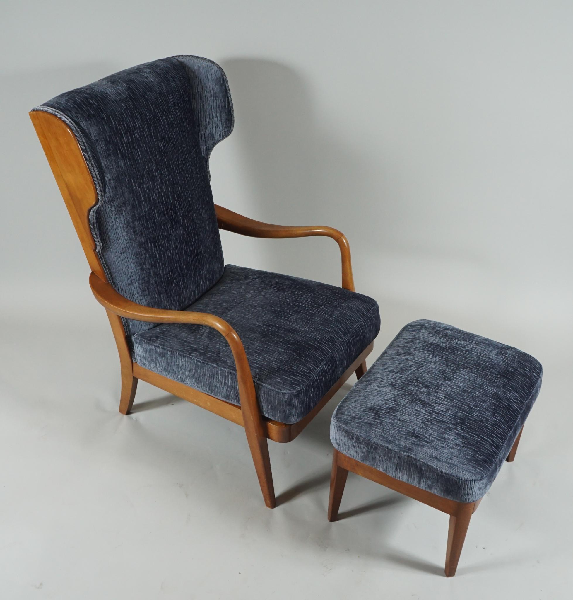 Wingback lounge chair & matching ottoman by Danish designer Anker Petersen newly recovered in
gray blue velour with wood frame.
 