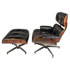 Loungesessel und Ottomane-Set nach Charles & Ray Eames in Palisanderholz, USA, ca. 1970er Jahre