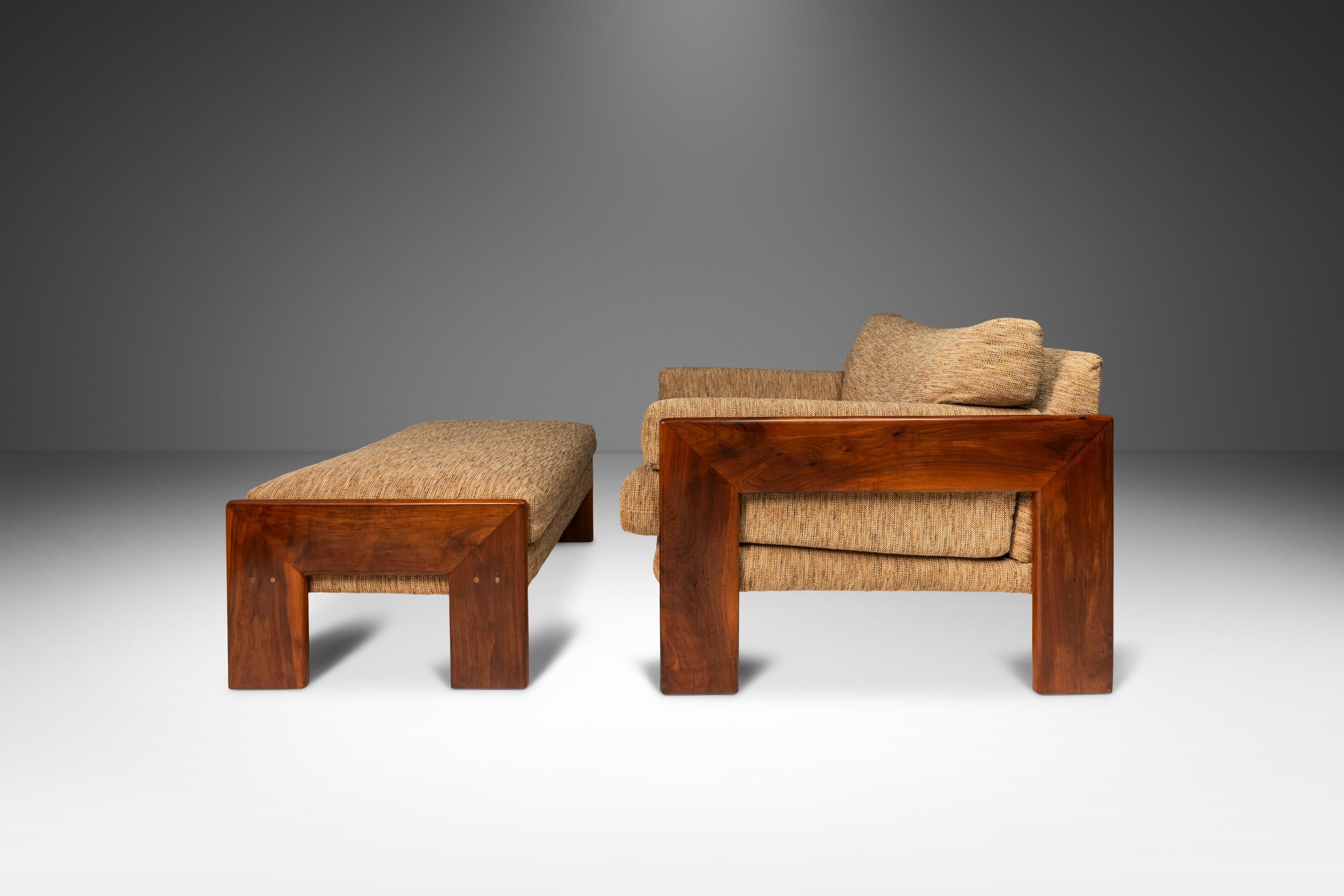 Introducing a rare and monolithic lounge chair and ottoman set designed by the influential Adrian Pearsall for Craft Associates. Audacious in it's scope, shape and materials used this extraordinary set is a true American masterpiece. With it's