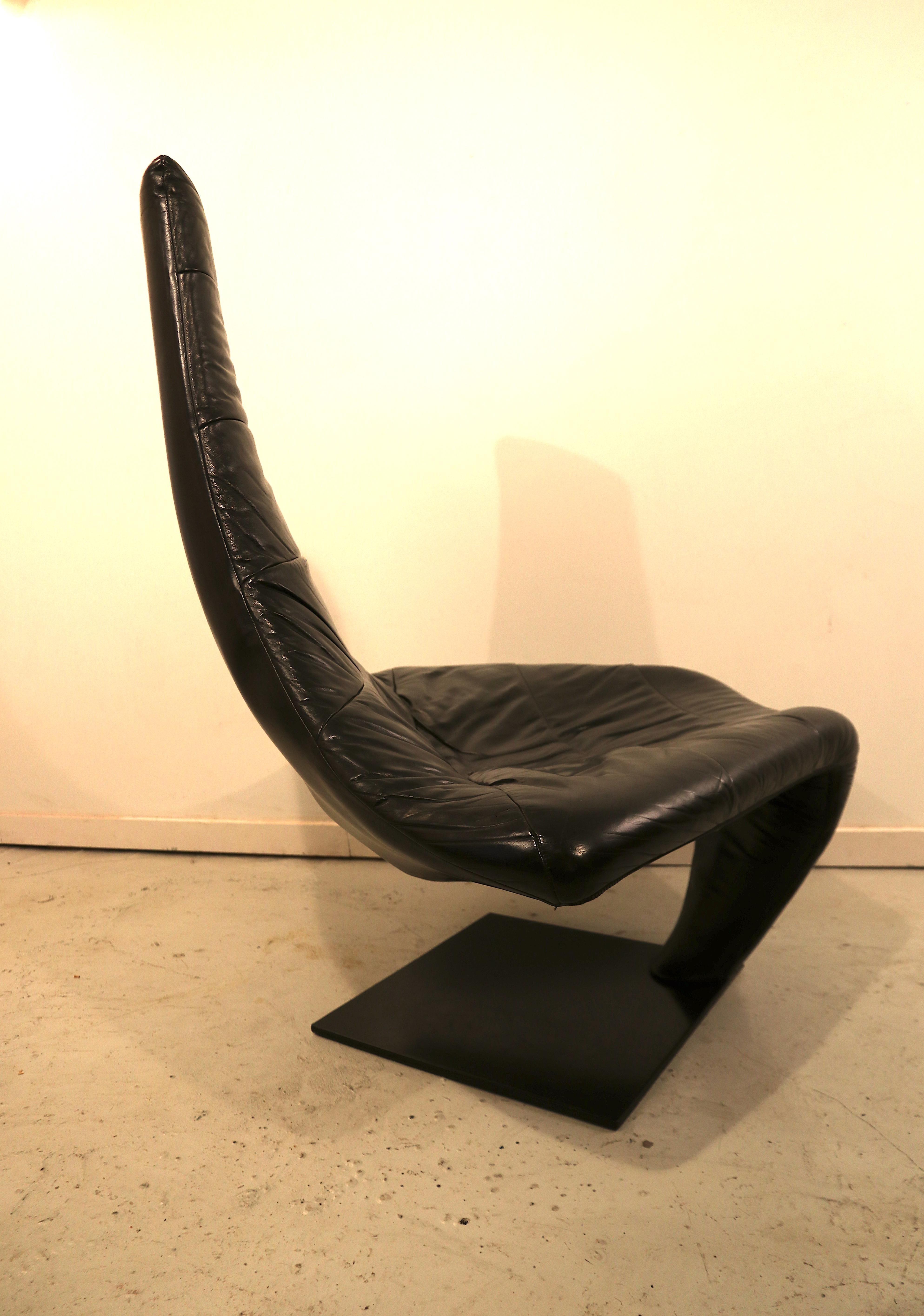 Beautiful sculptural black leather lounge chair named Turner, and nicknamed 