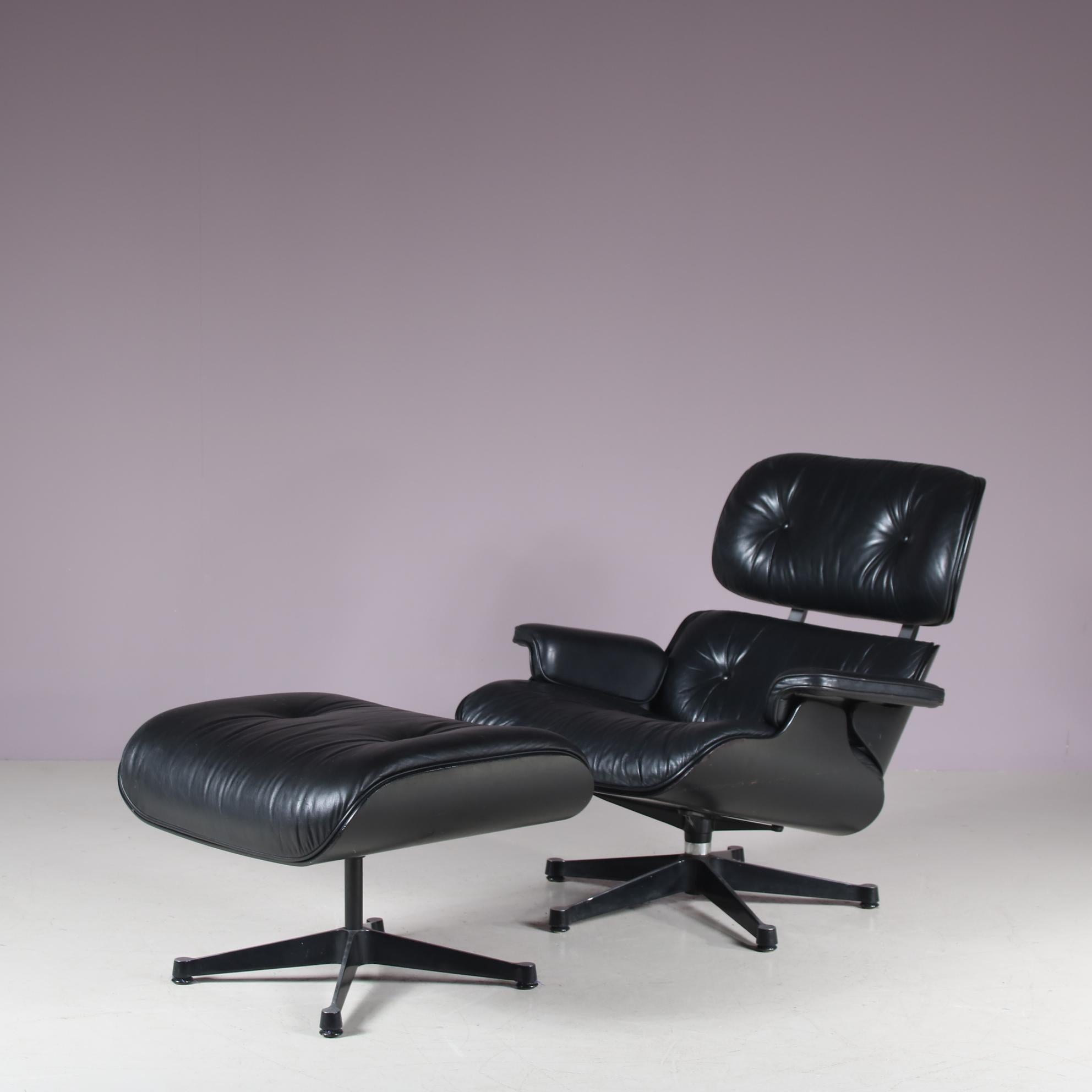 his lounge chair with matching ottoman was designed by Charles & Ray Eames and manufactured by Vitra in Germany around 1980.

It is a true masterpiece of design. The black plywooden shell with matching black leather upholstery all add to a seamless