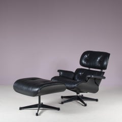 Lounge Chair con ottomana di Charles and Ray Eames per Vitra, Germania 1980