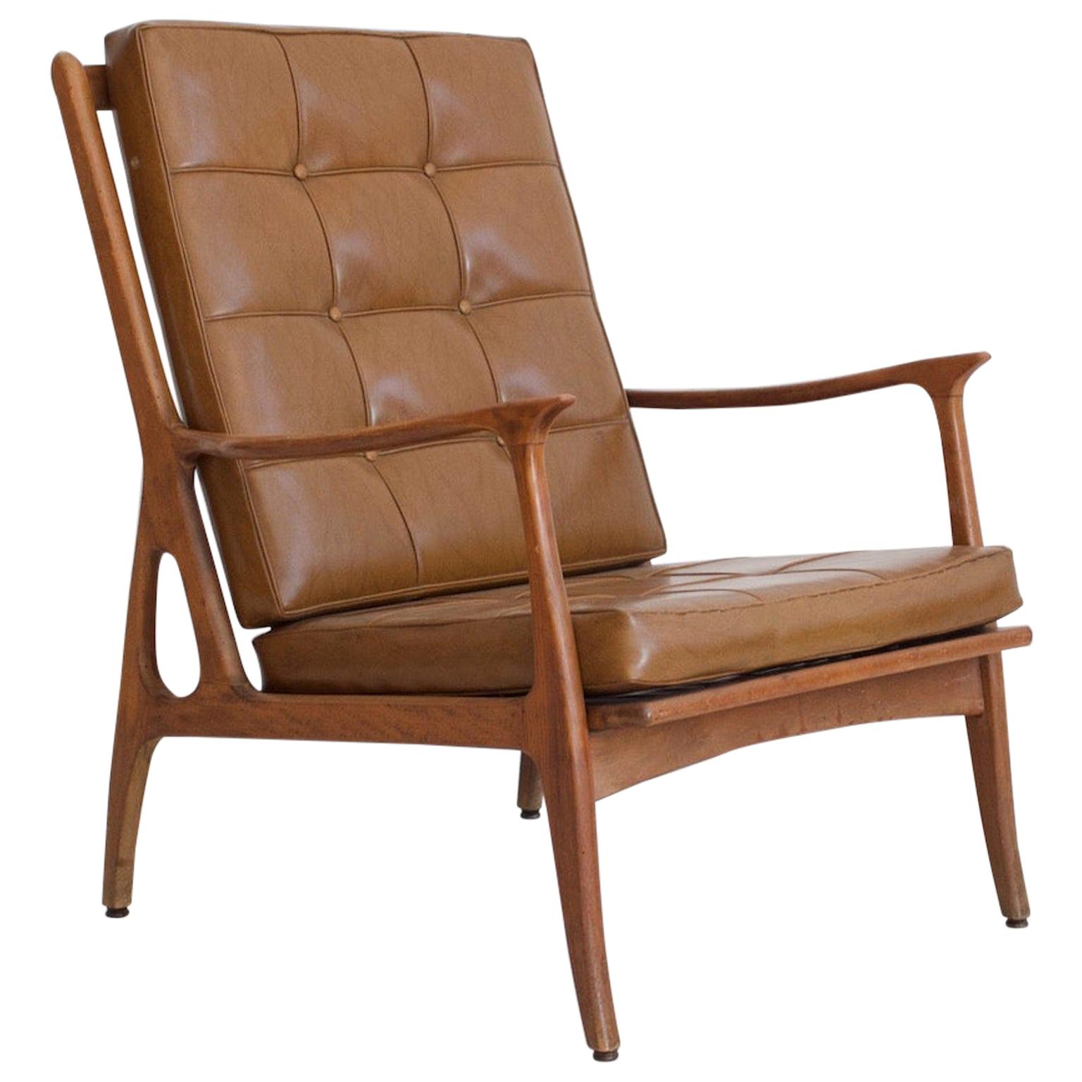 Brown leather lounge chair with footstool 1970 at 1stDibs