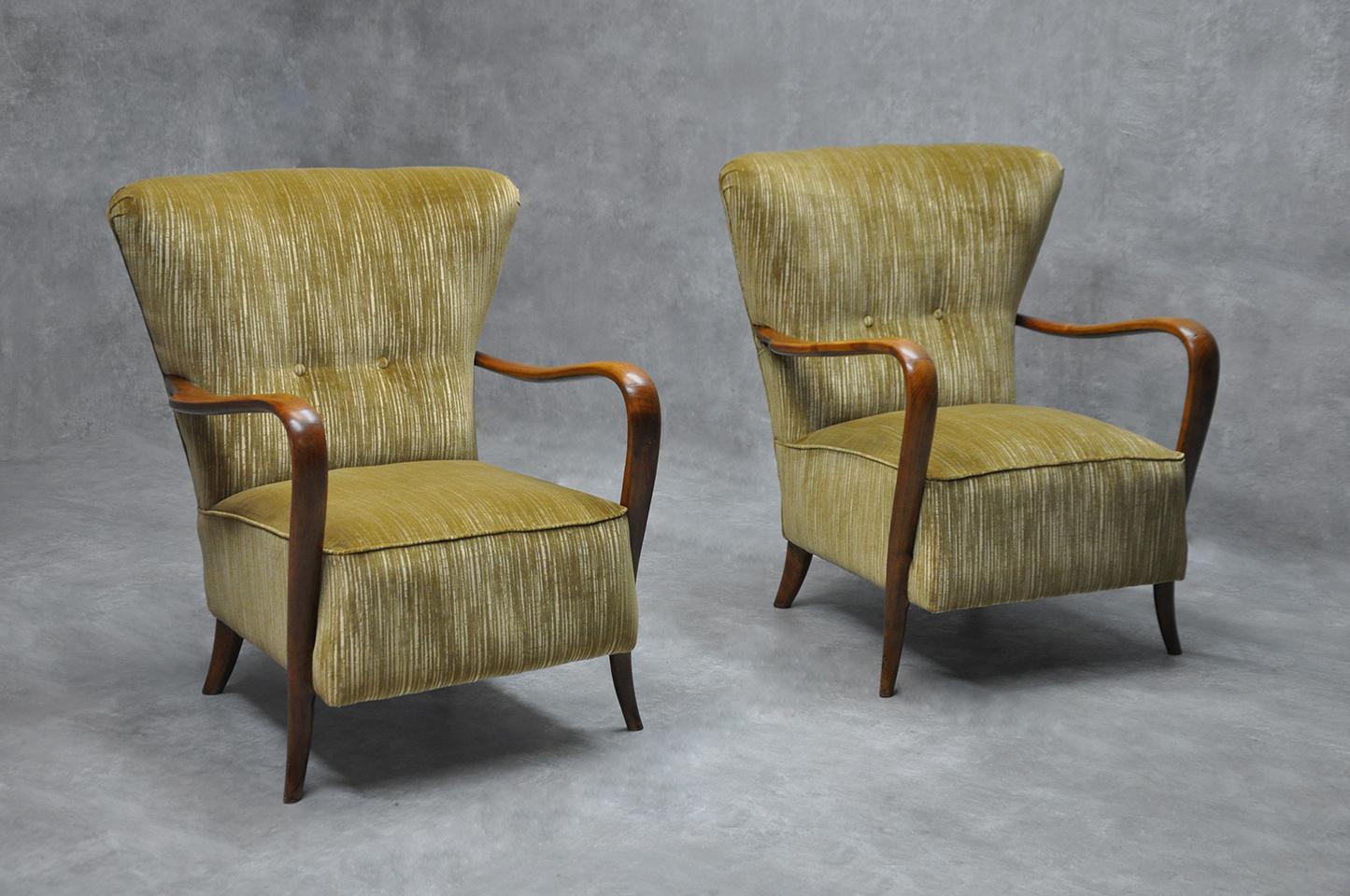 Set of two 1950s armchairs with wooden structure newly upholstered.