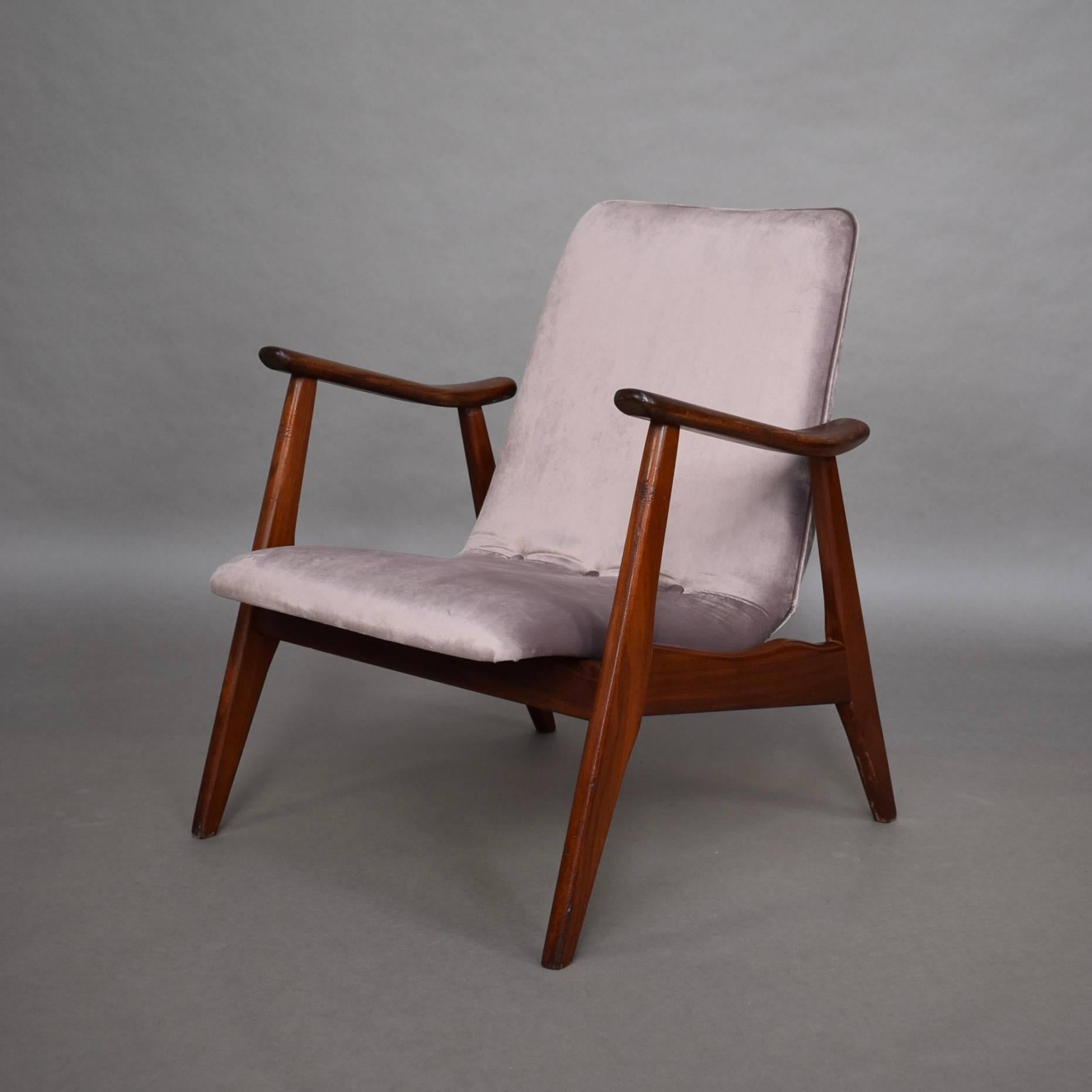 Beautiful pair of Dutch design lounge chair by Louis Van Teeffelen, 1960s. The chairs are made of solid teak and are reupholstered with a beautiful trendy vintage pink velvet fabric. 
We have multiple chairs available (in different colors).
It is