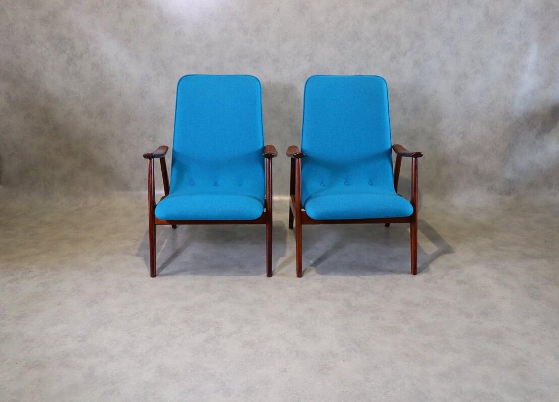 Pair of easy chairs designed by Louis Van Teeffelen. Produced in the Netherlands by WéBé during the 1950s. Frame made from solid teak wood and seats reupholstered in blue high quality fabric. WéBé was founded in 1938, but it flourished in the 1950s