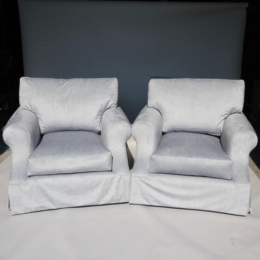 Super comfortable pair of Marge Carson lounge chairs. These are the plush chairs that everyone still wants; ones so inviting you could sit and read a book cover to cover in without wanting to get up! Newly reupholstered in silky smooth light