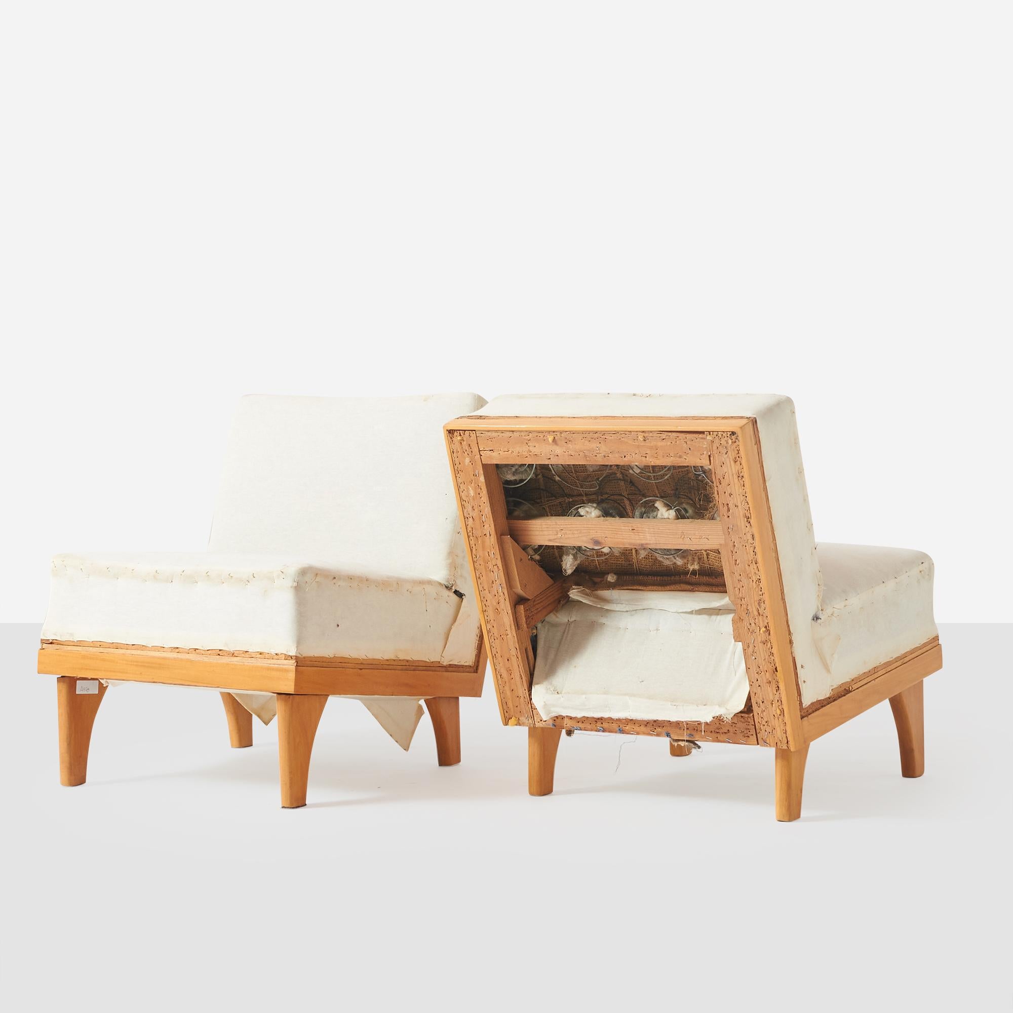 A pair of canted Lounge chairs with unusual form legs for Domus with the frame in pine. Ready for restoration.

Bibliography: 