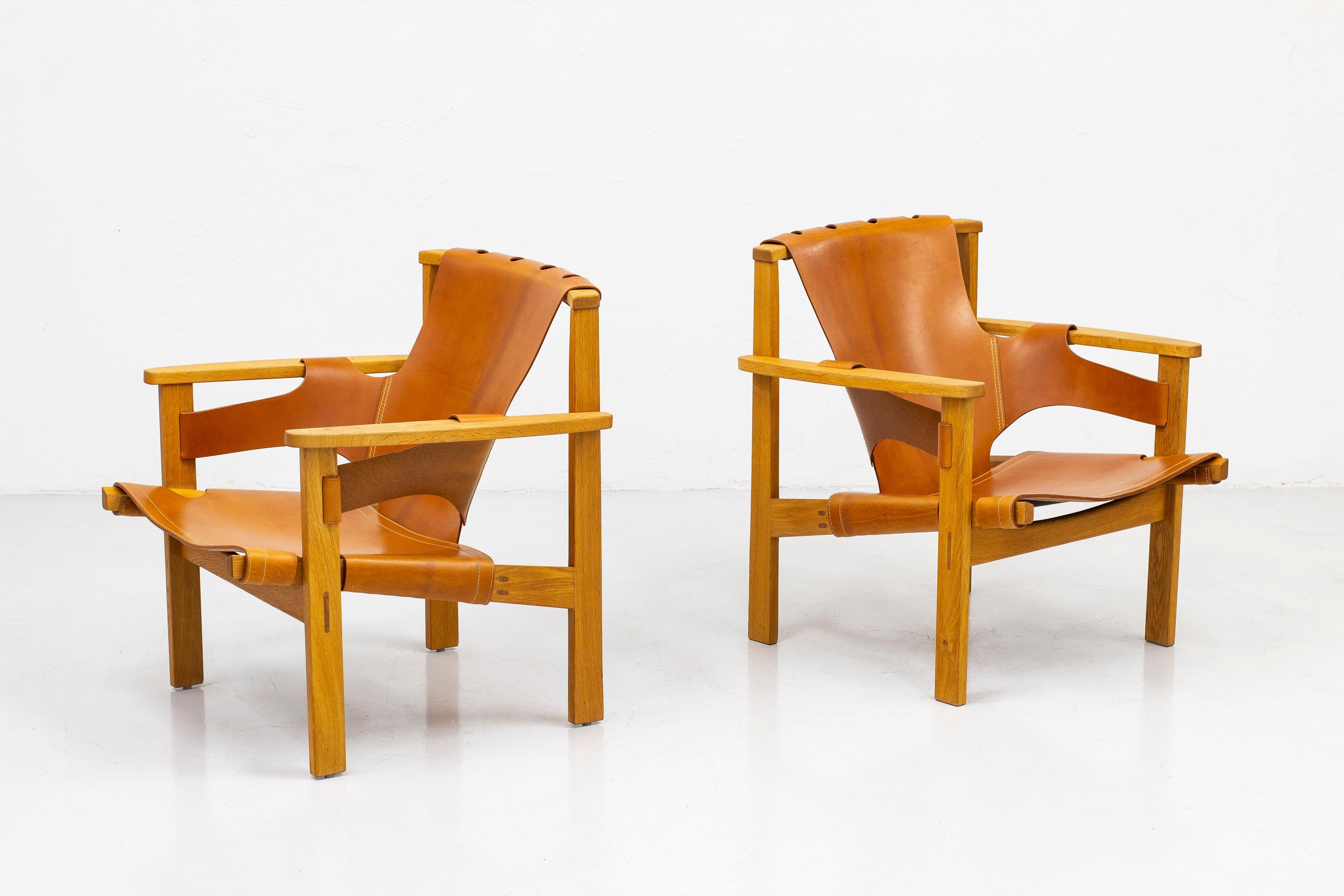 Scandinavian Modern Lounge Chairs in Oak and Leather by Carl-Axel Acking, Nk, Nordiska Kompaniet