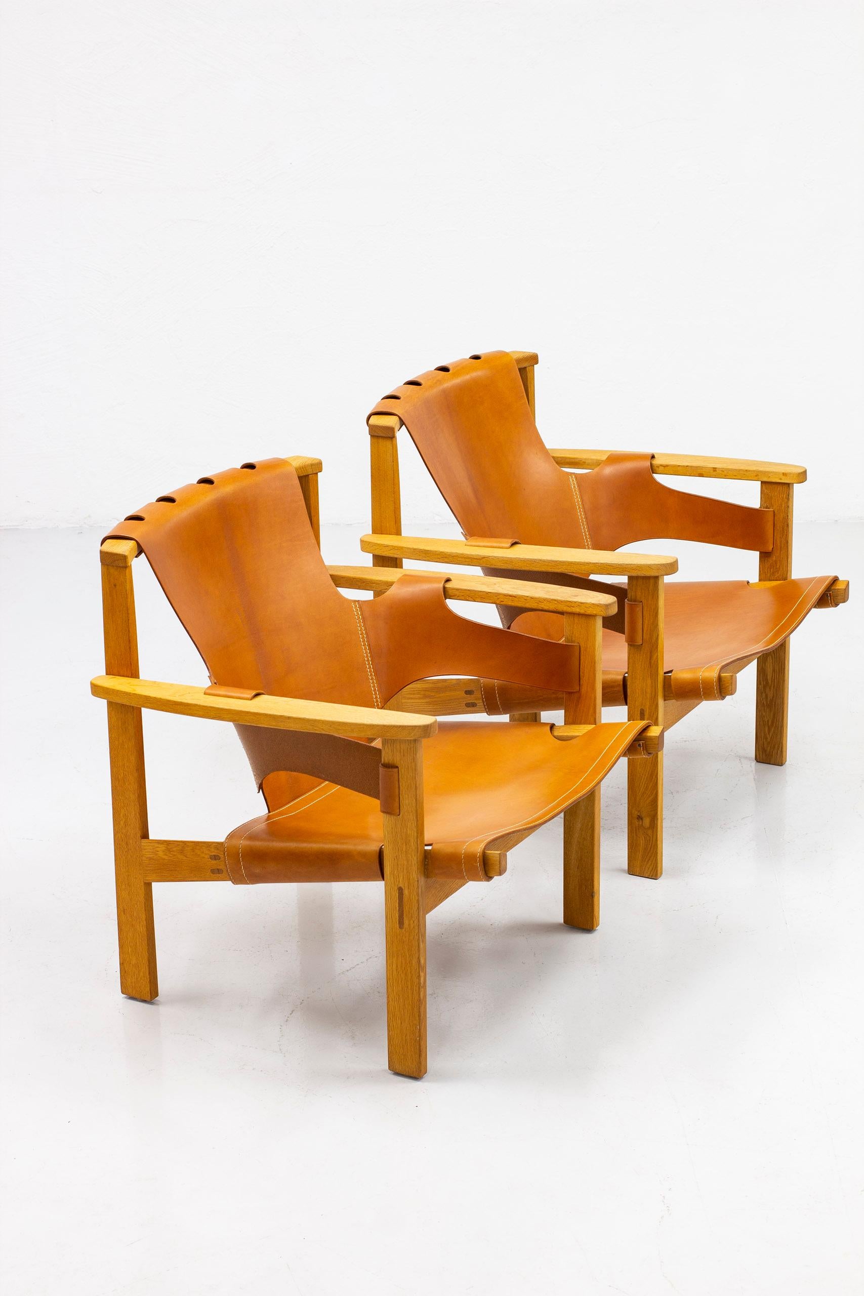 Swedish Lounge Chairs in Oak and Leather by Carl-Axel Acking, Nk, Nordiska Kompaniet