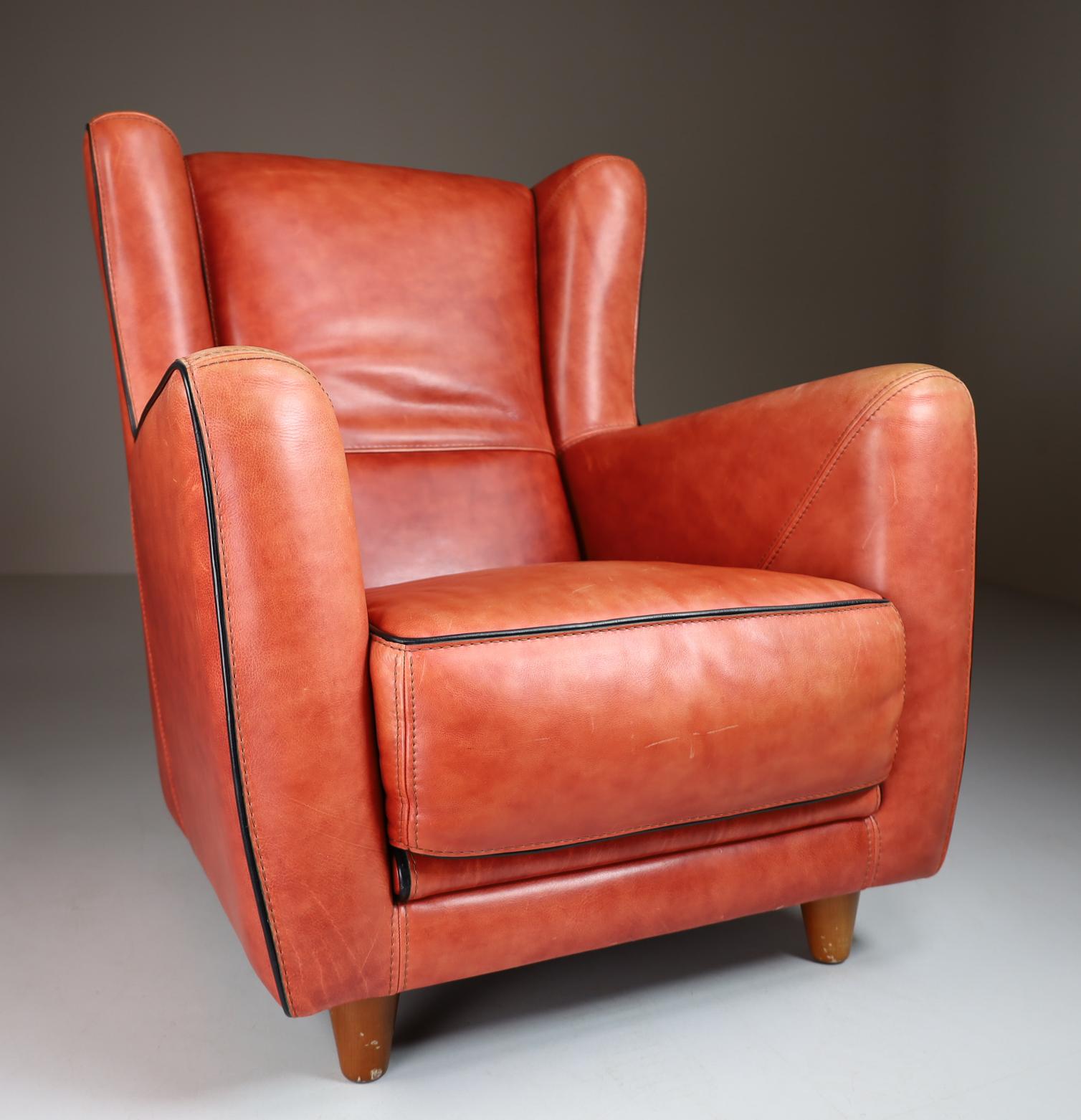 High-quality lounge chairs by P. Baxter for Baxter Italy Model Bergére, Design 1994. Very comfortable armchairs with beautiful details. Very high-quality processed. Incredible beauty and charm with gorgeous warm leather patina, and classic Italian