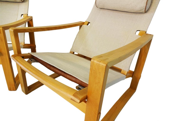 A very rare pair of Danish midcentury Børge Jensen & Sønner ‘Safari’ lounge chairs in canvas and beech.

First designed and produced in the mid-1960s these chairs are a development by the original manufacturer of Børge Jensen & Sønner’s ‘Safari’