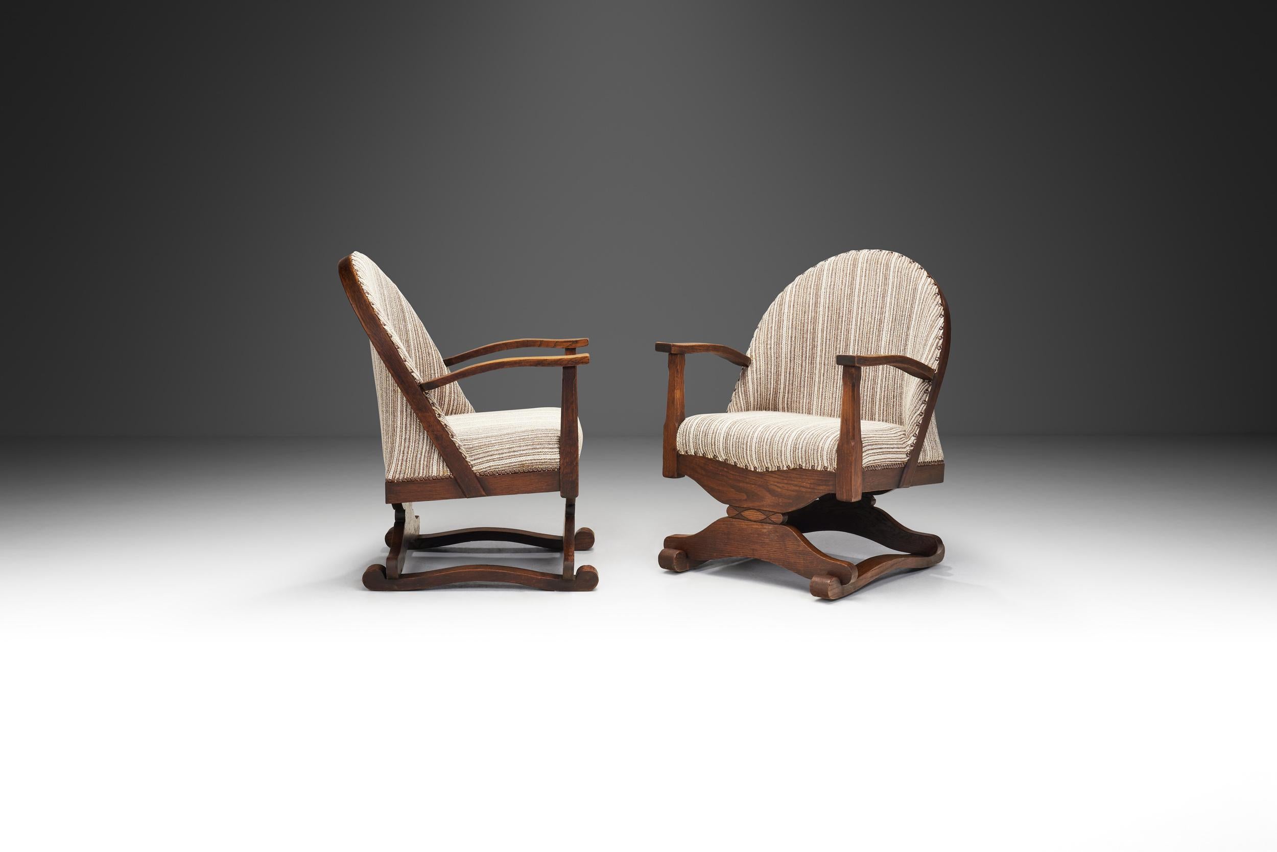 Spanish Lounge Chairs with Dark Stained Oak Frames and Carved Details, Spain 1930s For Sale