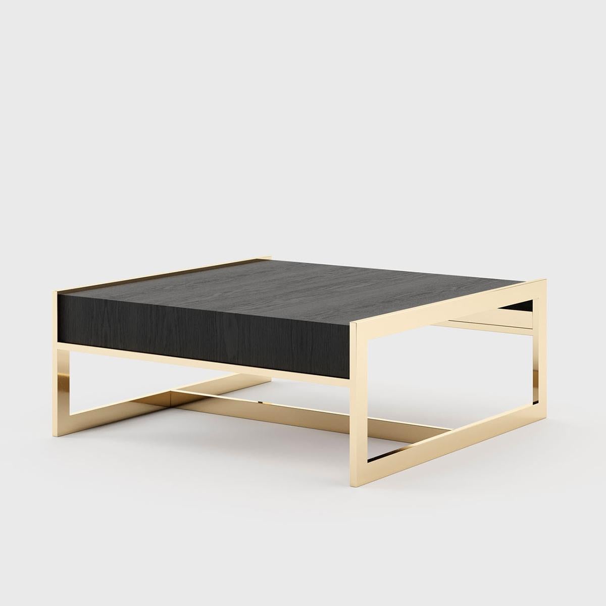 Coffee table lounge down with structure in polished
stainless steel in gold finish. With ash top in black matte
finish. Also available with other stainless finishes and
other wood finishes on request.