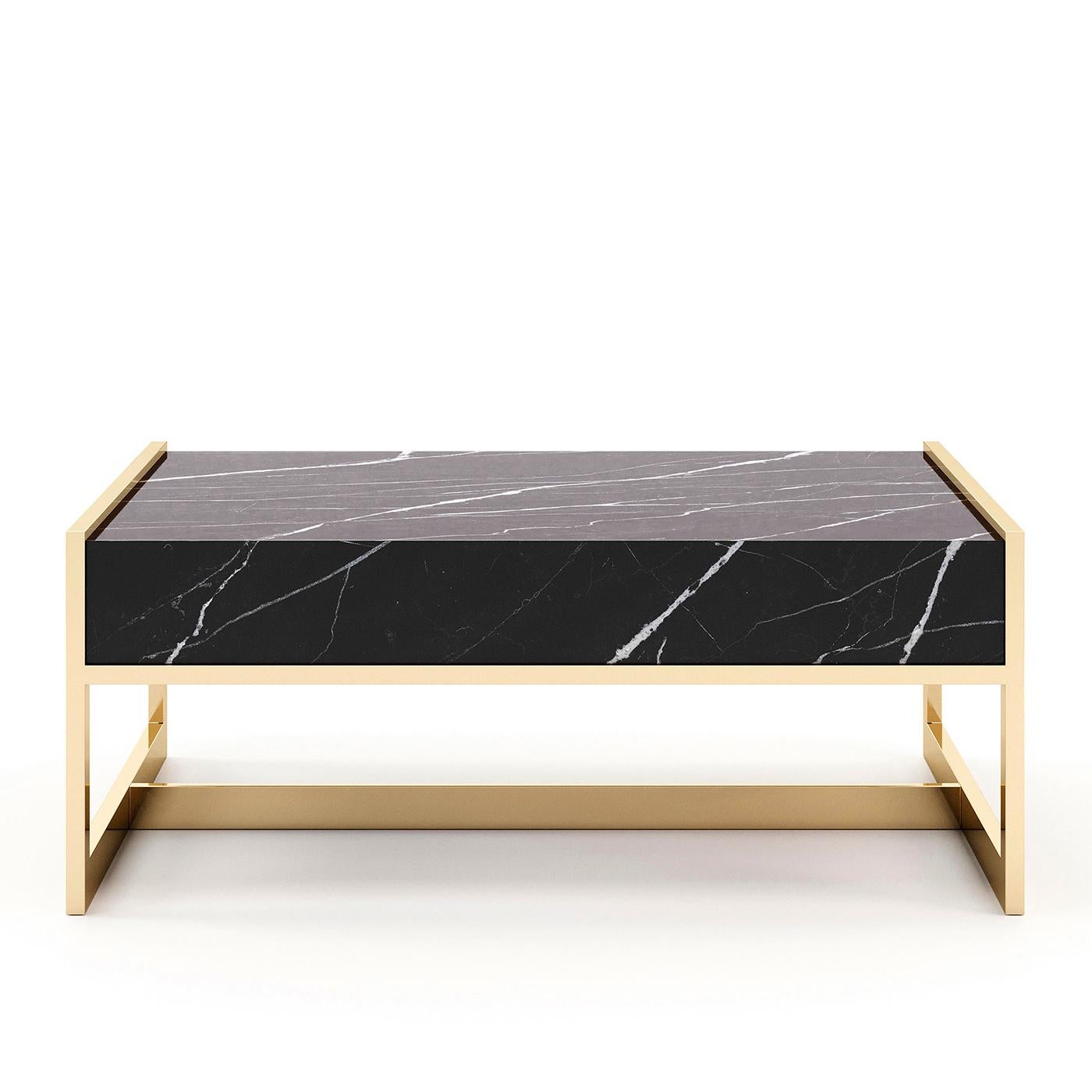 Coffee table lounge down marble with black marble top and
with polished stainless steel structure in gold finish.
Also available with other stainless steel finishes on request.