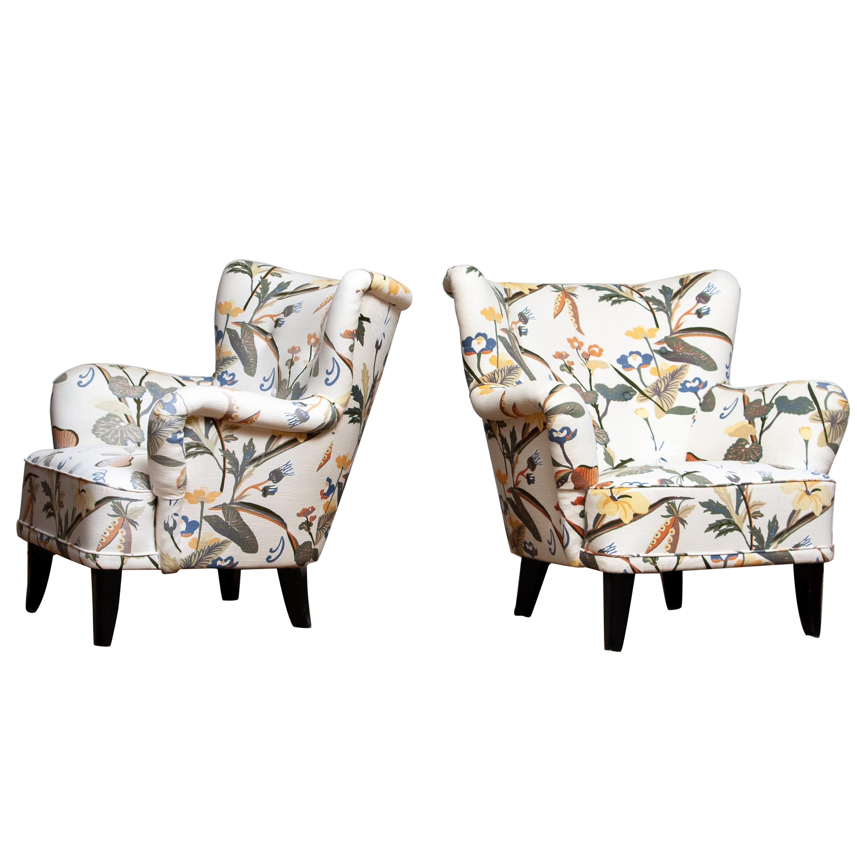 Set of two beautiful 1940s-1950s lounge / club chairs upholstered, in a later period, with the typical floral print fabric designed by Josef Frank.
The chairs are designed by Ilmari Lappalainen for Asko in Finland
The overall condition is good.