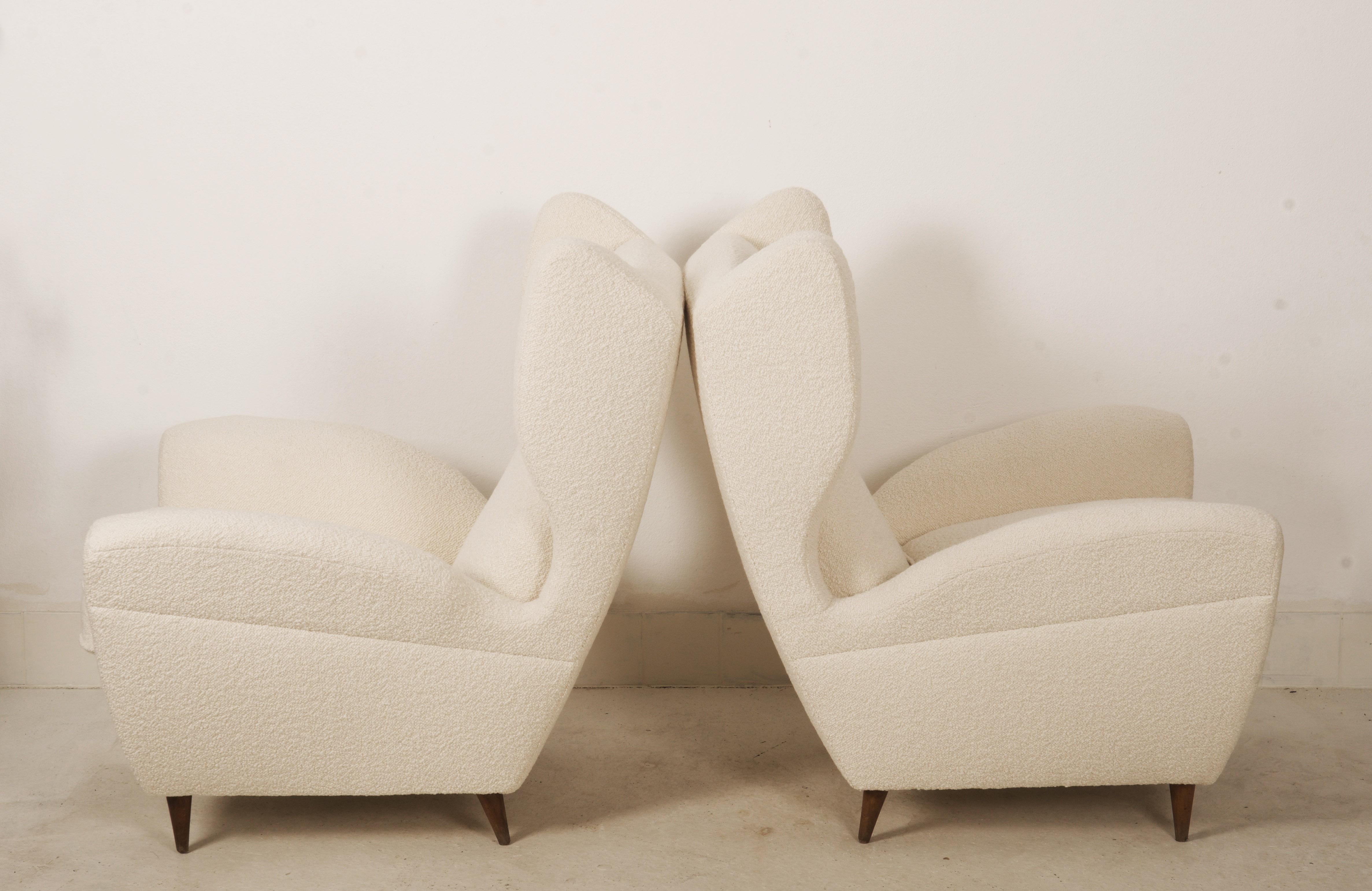 Italian Lounge or Wingback Chairs in Cream Bouclé by Melchiorre Bega For Sale