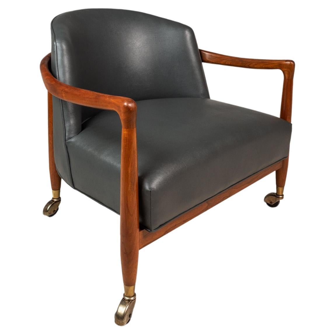 Silla Lounge Tub Barrel de nogal y vinilo según Finn Andersen, EE.UU., c. 1960