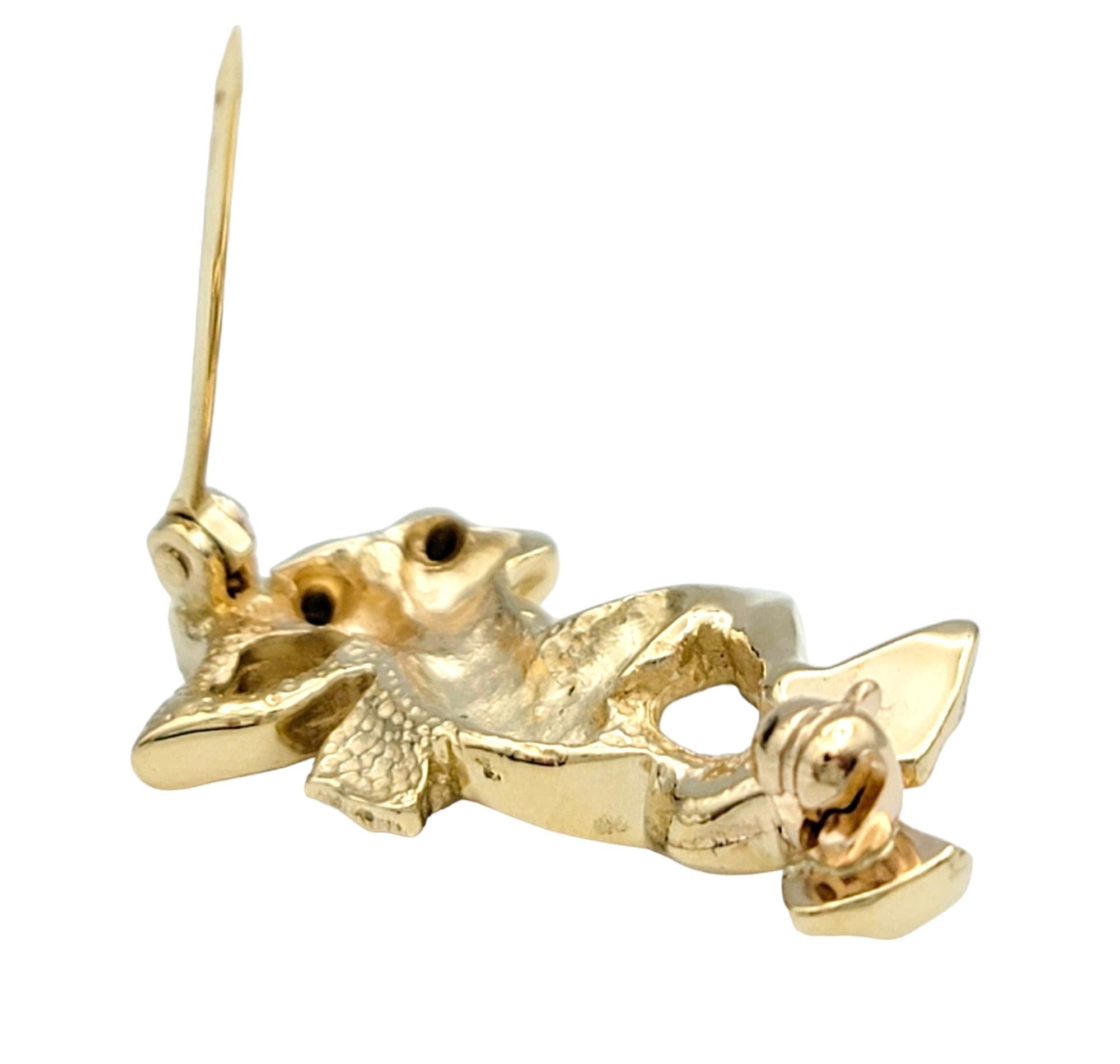 Women's Lounging Frog with Diamond Eyes Brooch Pin Set in 14 Karat Yellow Gold For Sale