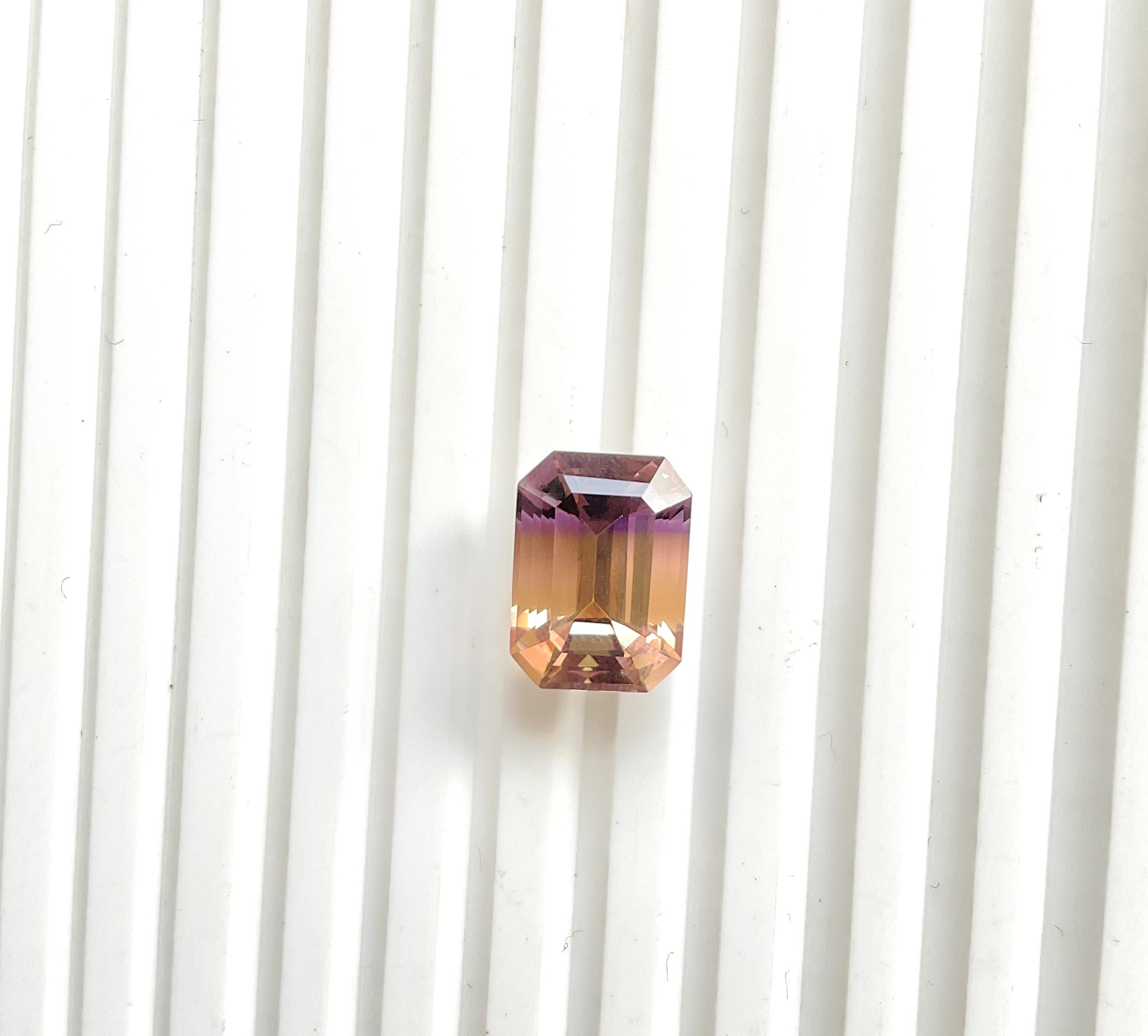Gemstone Natural Ametrine
Clarity : Loupe Clean
Shape : Octagon
Size : 15x11x9 mm
Weight : 10.45 Carats
Origin : Bolivia
Treatment : None
.