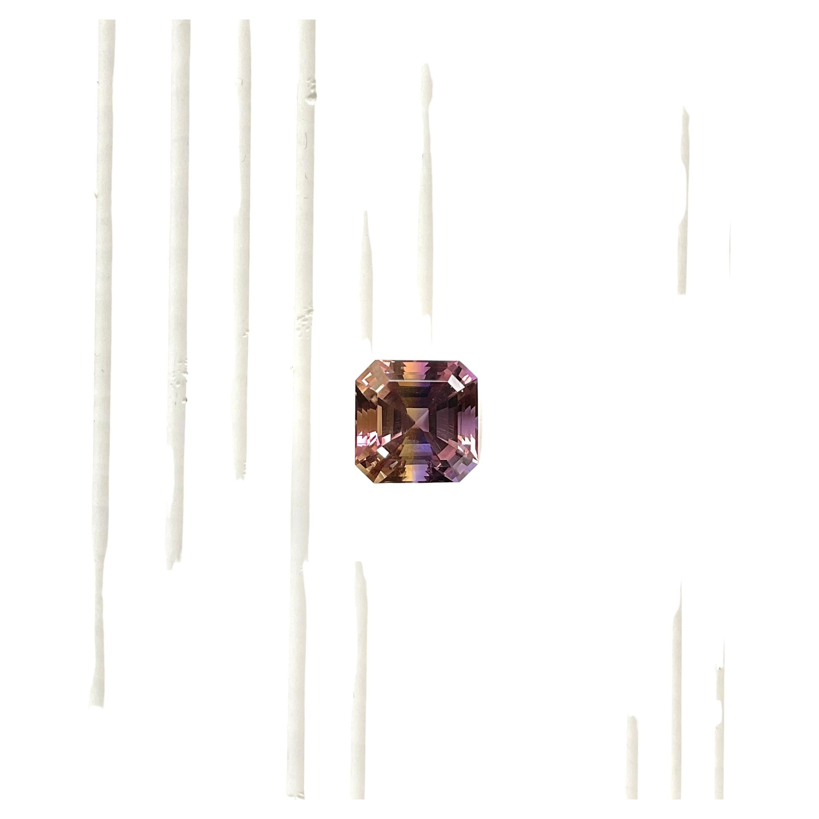 Gemstone Natural Ametrine
Clarity : Loupe Clean
Shape : Radiant
Size : 15x15x12 mm
Weight : 17.30 Carats
Origin : Bolivia
Treatment : None
.