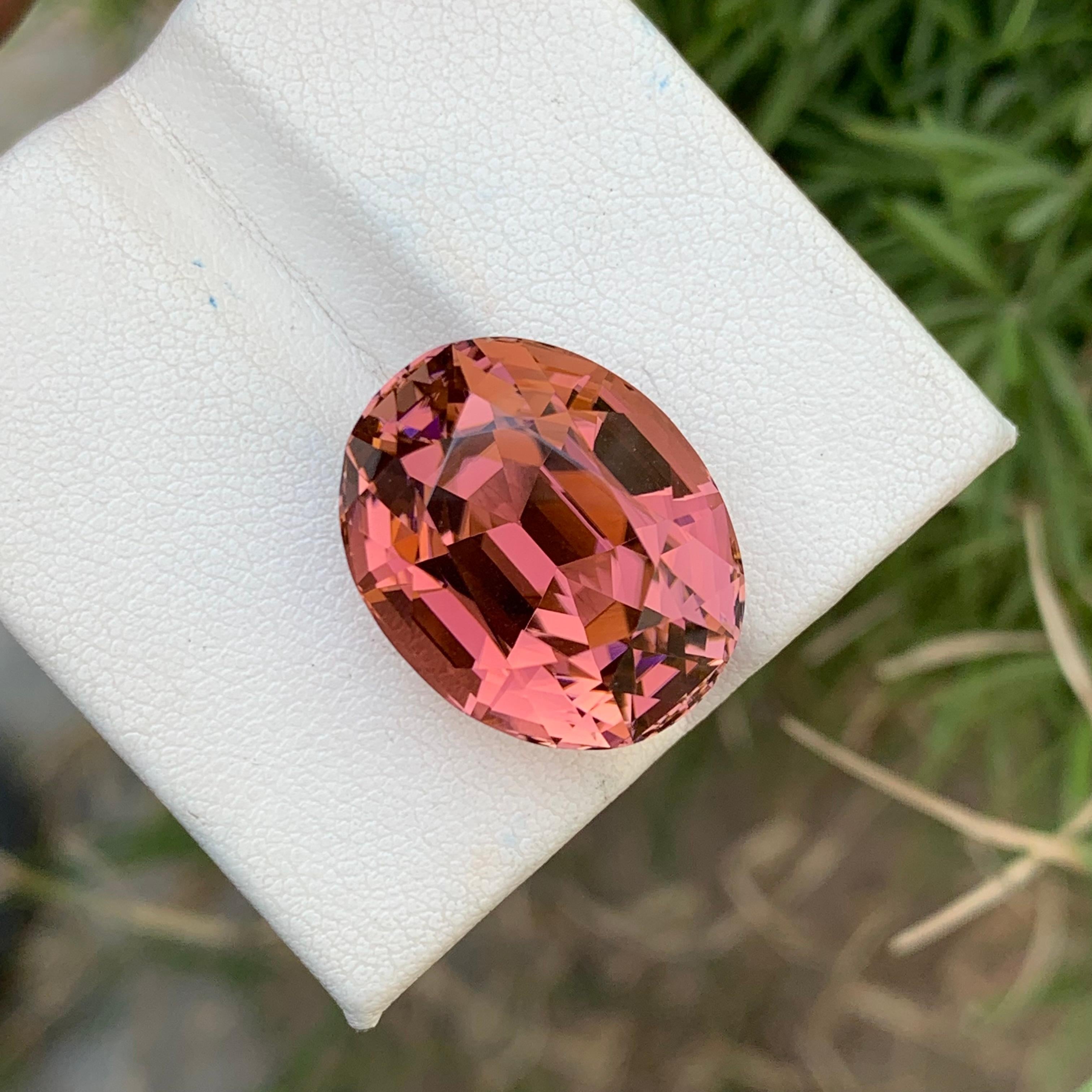 Loose Tourmaline 
Weight: 28.40 Carats 
Dimension: 19.8x15.9x13.6 Mm
Origin: Kunar Afghanistan 
Shape: Oval
Color: Red Peach 
Treatment: Non
Quality: AAA
Certificate: On Customer Demand 
Peach red tourmaline, a mesmerizing variety within the diverse