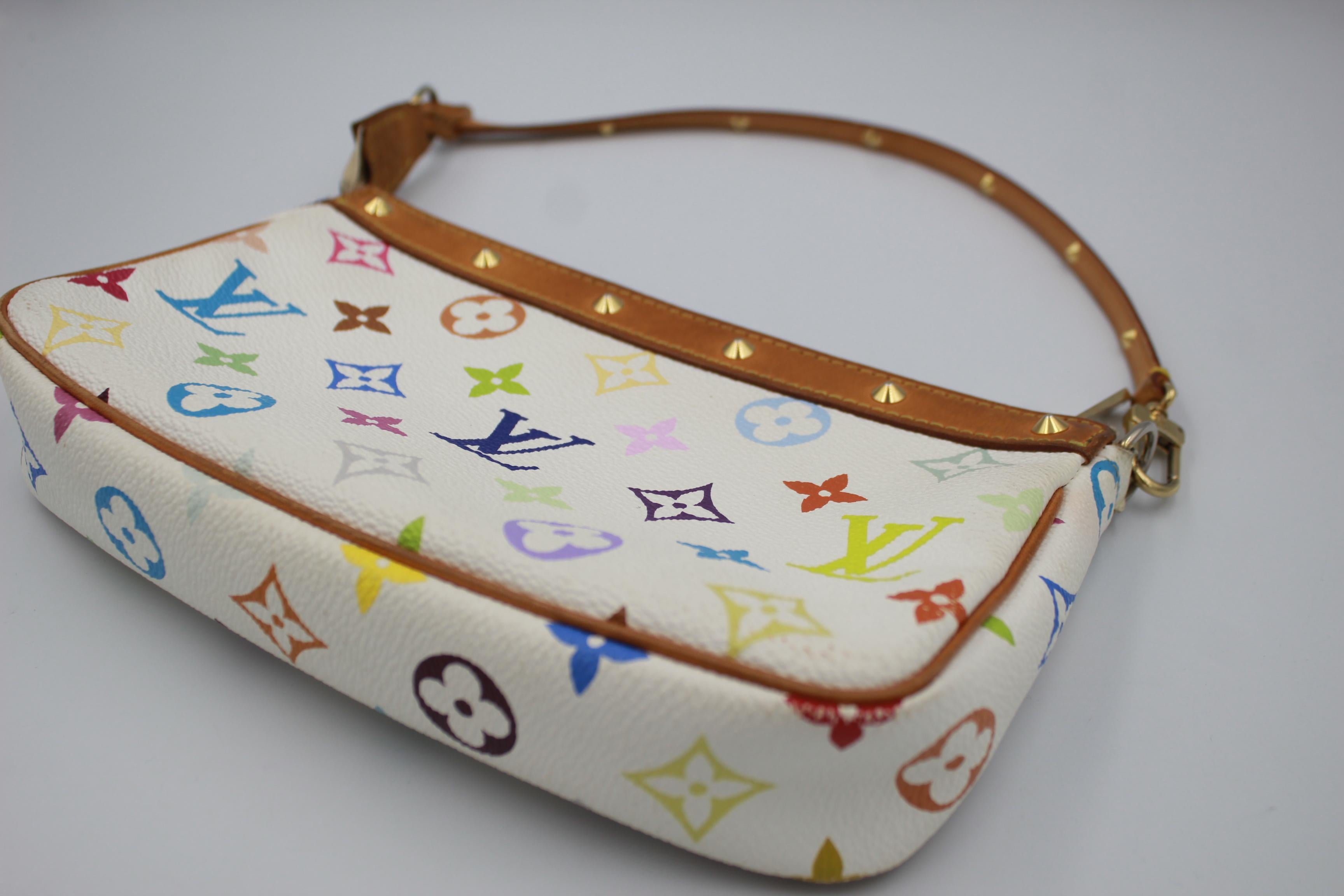 Lous Vuitton accessoire clutch in multicolours monogram by Takashi Murakami .
Limited edition by Takashi Murakami. 
Collection : 2004.
Good condition, with some light signs of wear :
( few spots of light decoloration at the corners and on the zipper