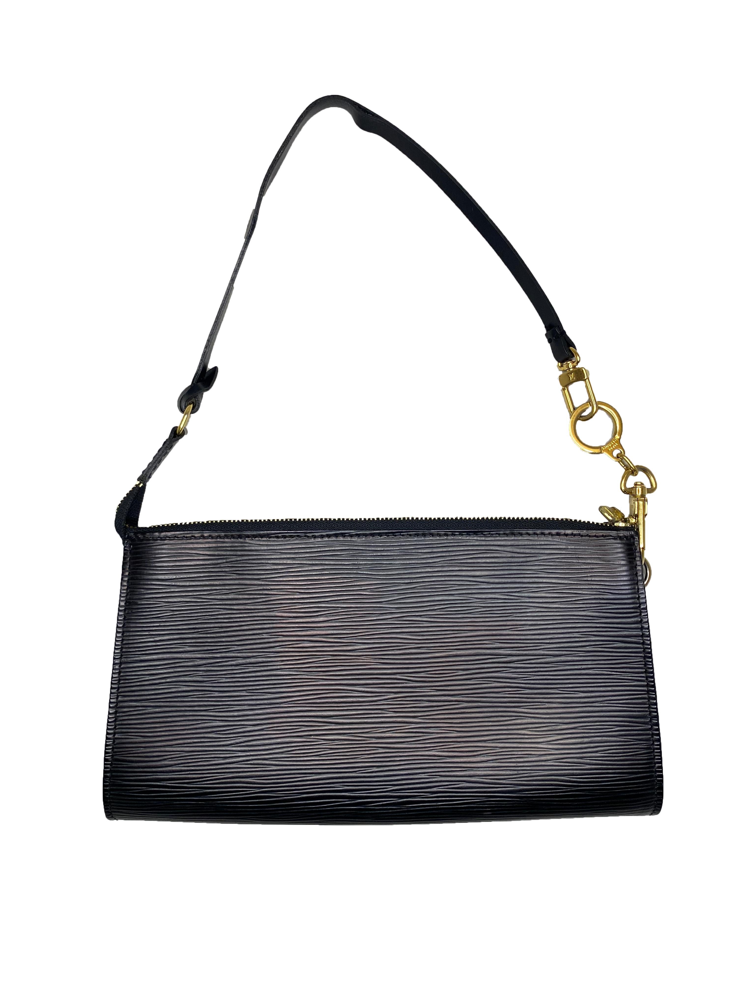Mini Louis Vuitton pochette bag in textured crepe effect black Epi leather. Embossed Louis Vuitton logo in righthand bottom corner. Single leather shoulder strap which is removable. Gold toned hardware. Zip closure. LV zip pull and branded handle
