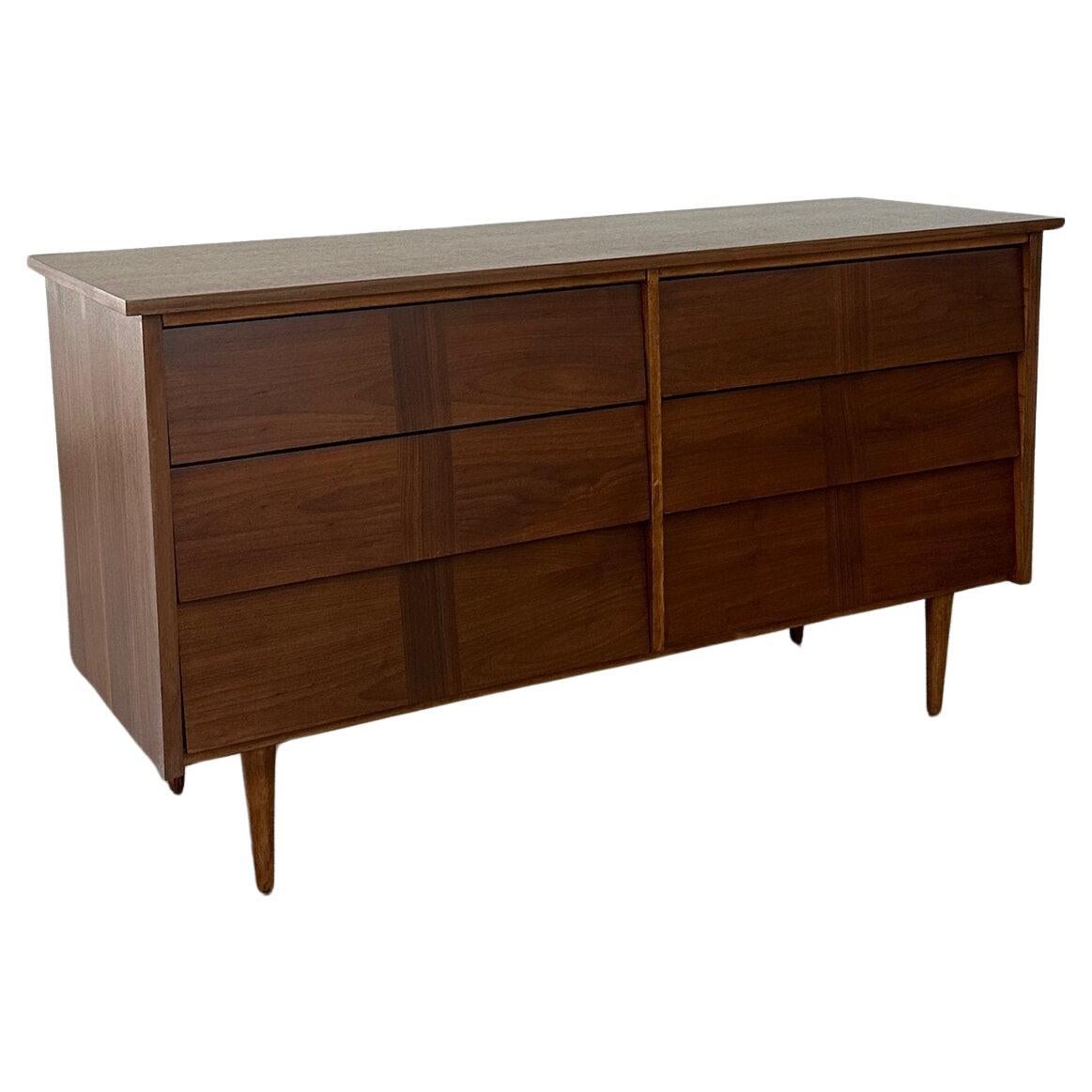 Louvered low boy dresser